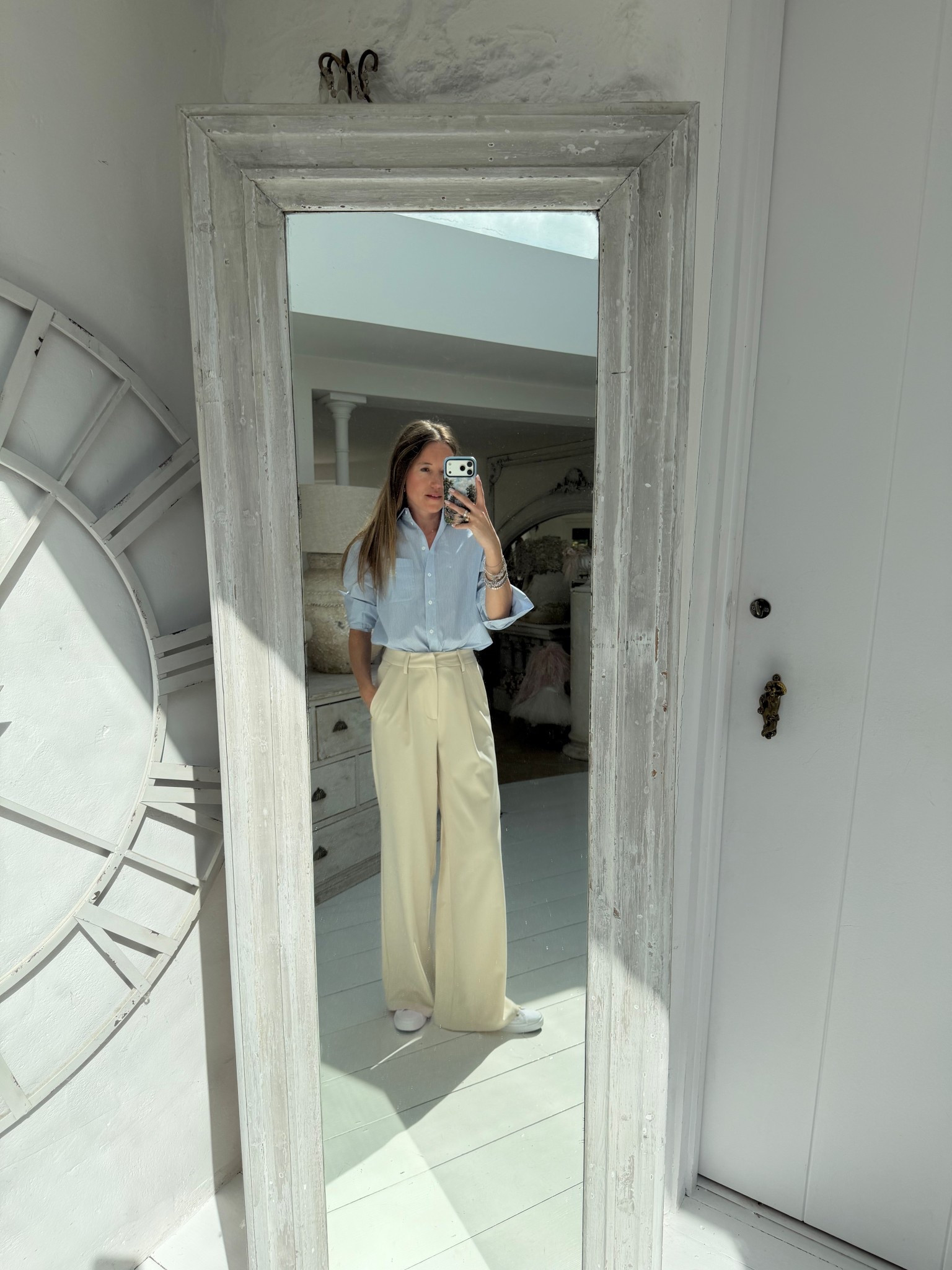 The perfect everyday essentials for that country club style 

Blue white stripe shirt, high waisted trousers, wide leg trousers, white trainers, canvas trainers, 

#LTKspring #LTKstyletip #LTKsummer