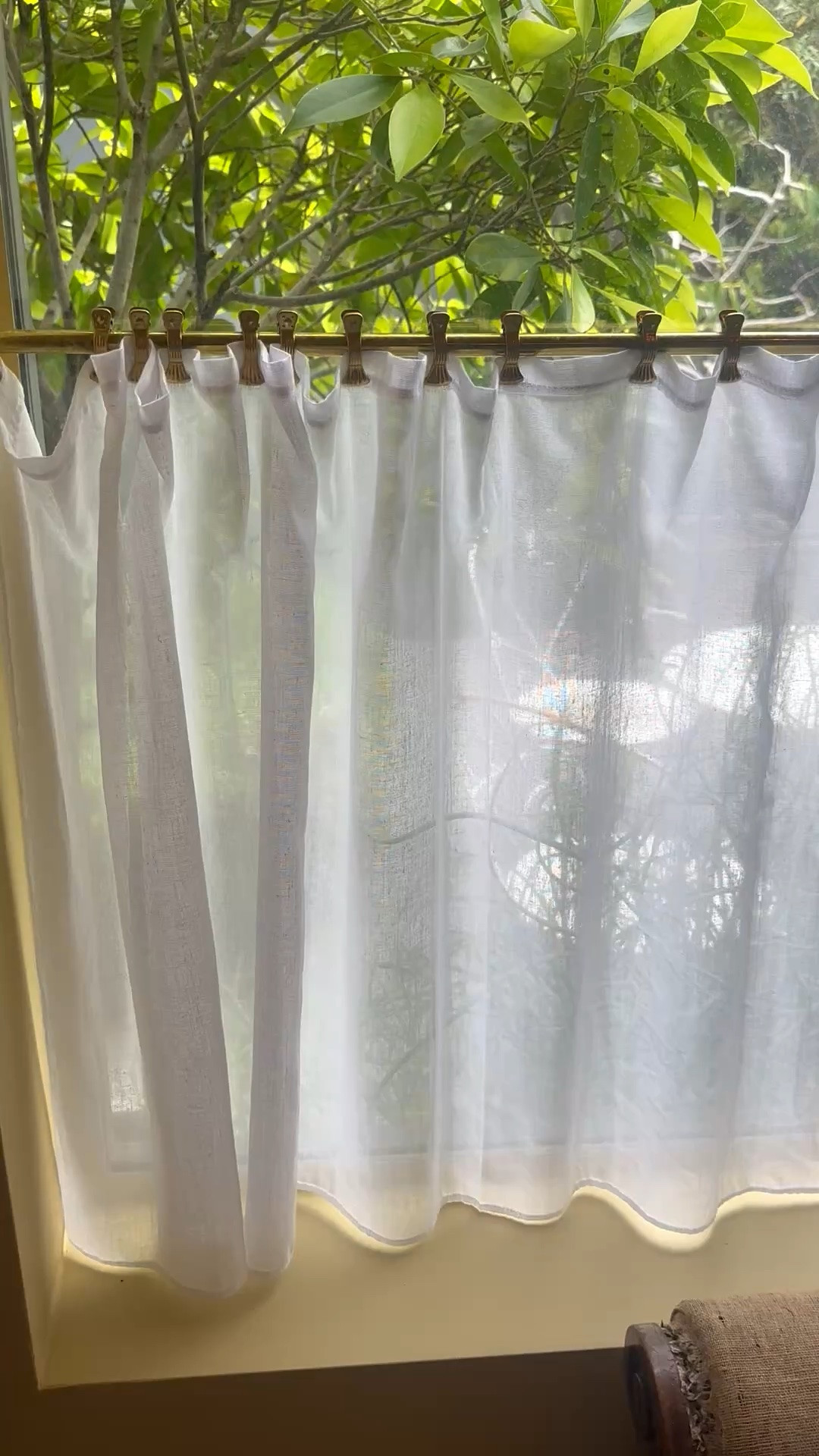 There’s something timeless about a café curtain. The look feels distinctly British—relaxed, understated, and effortlessly elegant.

I love how this simple setup gives you privacy exactly where you need it while still letting in beautiful natural light. The sheer linen softens the sunlight, creates a gentle glow throughout the room, and makes even an ordinary afternoon feel calm and inviting. Paired with classic brass café curtain hardware, it adds just enough character without overwhelming the space.

Functional design is always the most beautiful design. You keep the view, welcome the sunshine, enjoy your privacy, and add a layer of charm all at once.

A small detail that makes a room feel collected, lived-in, and quietly chic.

#CafeCurtain #CurtainHardware #BritishStyle #EnglishInspired #TimelessDesign #ClassicInteriors #LinenCurtains #WindowTreatment #InteriorDetails #HomeDecor #TraditionalHome #RelaxedLiving #NaturalLight #CozyHome #DesignDetails #ElegantHome #CottageStyle #EnglishCountryStyle #BrassHardware #HomeInspiration #LTKHome #WindowStyling #QuietLuxury #LayeredInteriors #ClassicStyle

#LTKdayinmylife #LTKHome