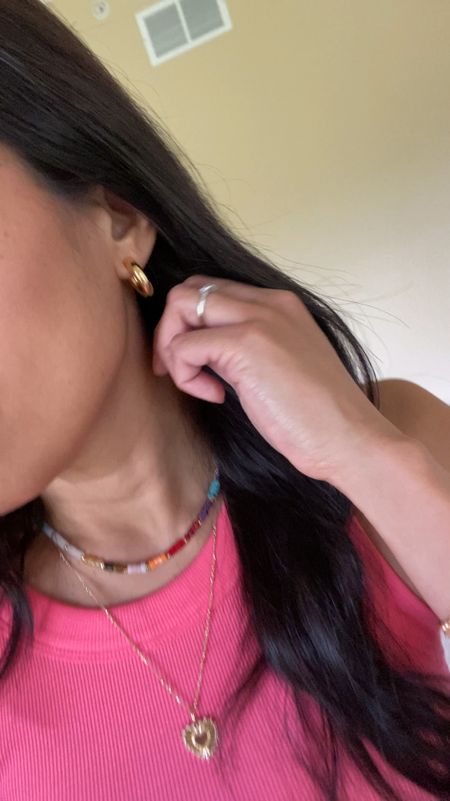 Hoop earrings are super lightweight and comfortable to wear. This is the smallest size; comes in 2 larger sizes as well. Gold plated. Gold color looks good. Also comes in silver. 
Everyday jewelry. 
Colorful necklace code Naomi20 to save. 
Heart charm necklace code HINTOFGLAM to save. 
Tank top true to size. 
Summer outfit. 
Blush and bronzer duo  

#LTKFindsUnder100 #LTKBeauty #LTKFindsUnder50