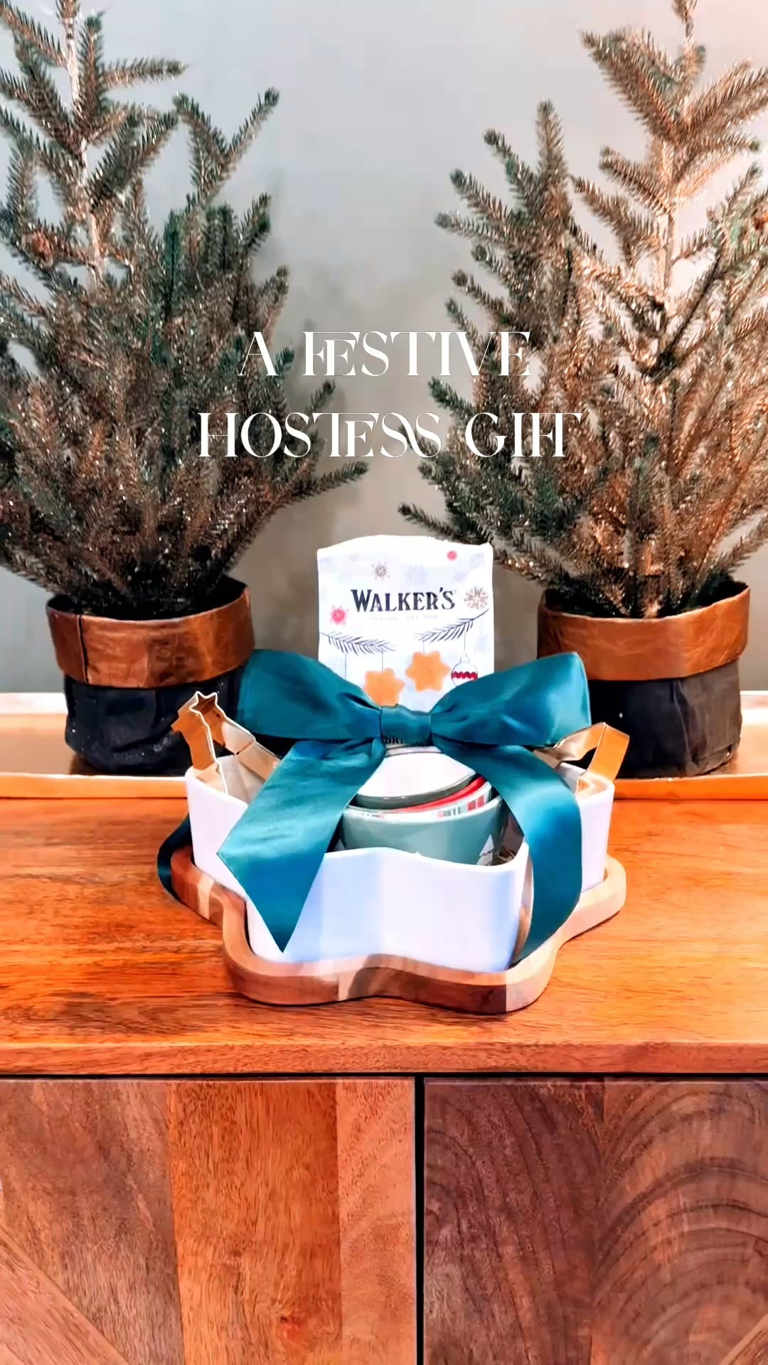 This little gift idea is what I call “festive simplicity with impeccable taste. “❄️✨
A snowflake-shaped baking pan, ceramic measuring cups, charming cookie cutters, festive butter cookies, and a touch of emerald satin — because presentation matters just as much as the gift itself. It’s thoughtful, charming, and beautifully put together… the kind of holiday surprise that feels both cozy and elevated.
It’s the perfect small gift for the cozy baker, the holiday hostess, or that friend who decorates their kitchen like it’s a Hallmark movie set. Trust me — this one will make them smile before they even untie the ribbon.
Until next time, darlings — stay elegant, stay merry, and always stay chic.


#LTKHoliday #LTKHome #LTKSeasonal