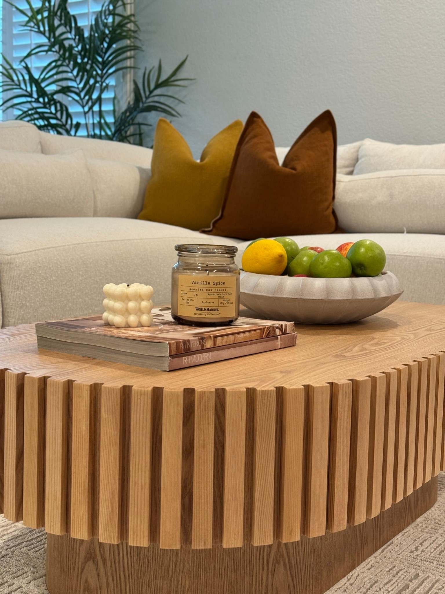 Cozy living room 🍂
This warm and inviting space brings in soft neutrals paired with rich orange and ochre tones. The sculptural wood coffee table adds natural texture, while layered textiles and earth-toned accents make it feel effortlessly relaxed and elevated.

• Cozy interiors
• Warm color palette
• Modern organic style
• Textured wood furniture
• Warm + inviting living room


#LTKHome #LTKActive #LTKStyleTip