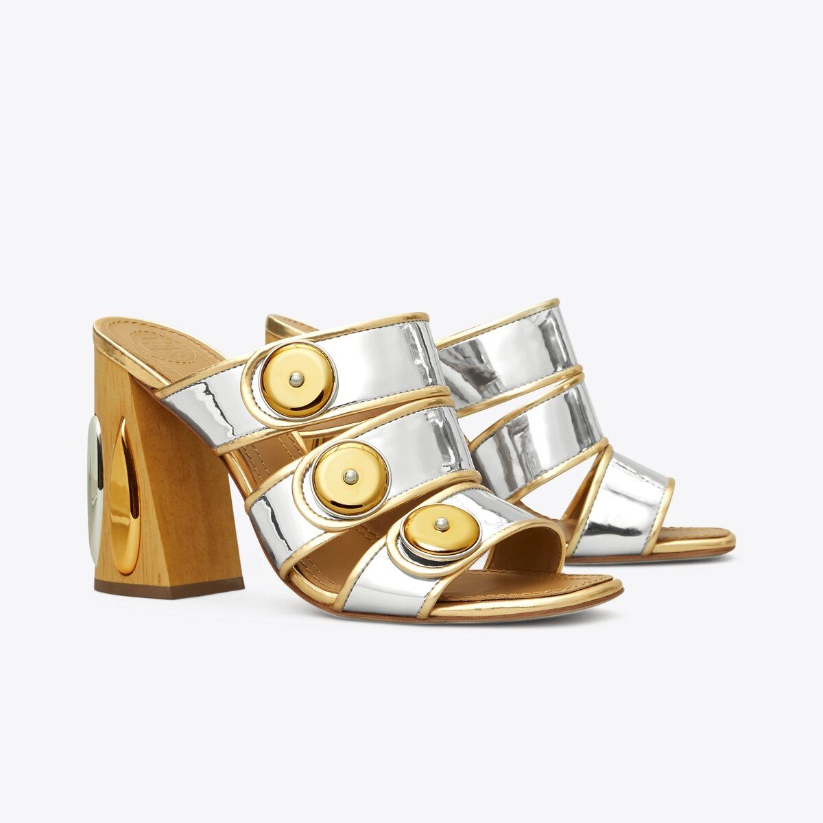 Everything is illuminated. Crafted in metallic leather with an inlaid wooden heel, the vintage-in... | Tory Burch (US)