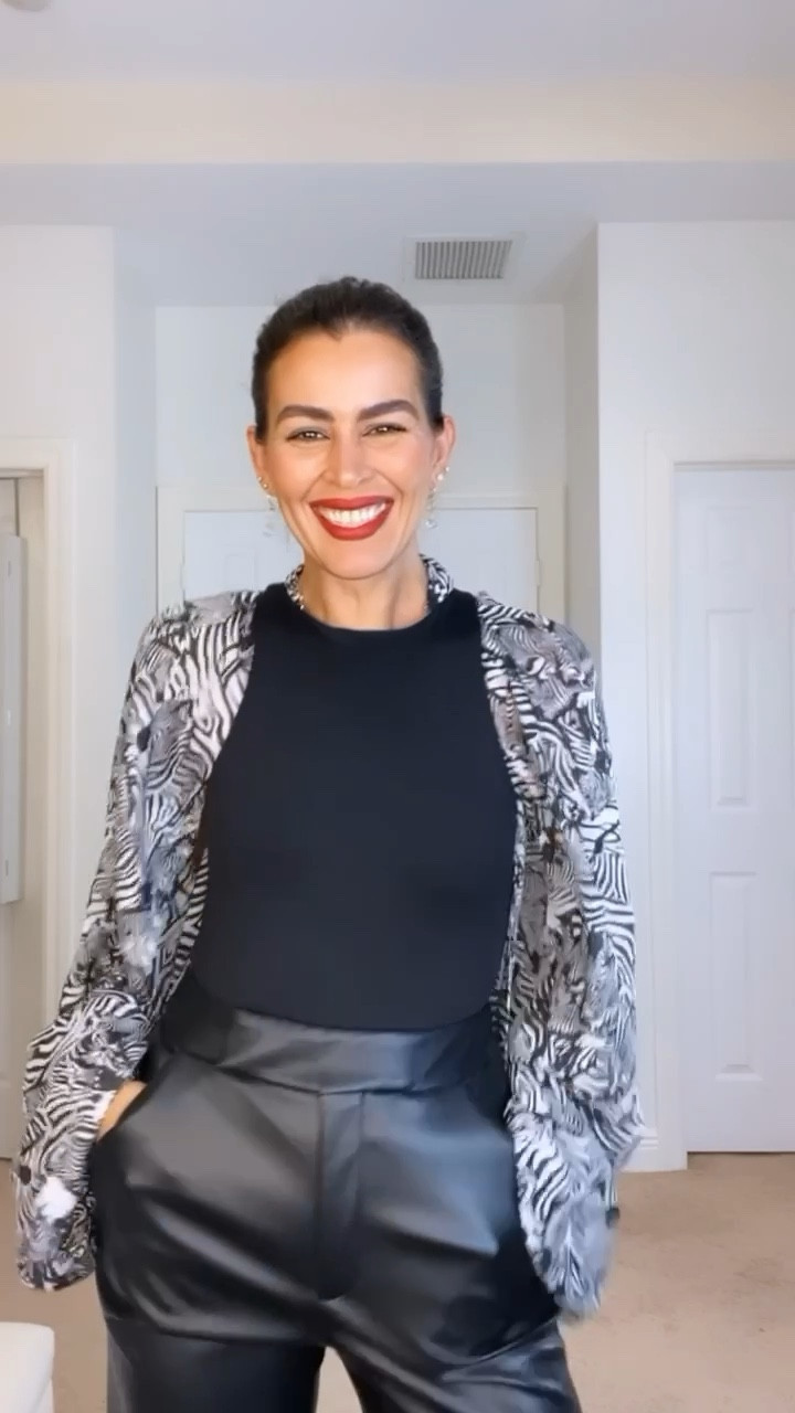 Bodysuit and faux leather pants are on sale! Wearing a size S in the black bodysuit, 4 in the pants. Adding similar scarves. Lipstick is Russian red by Mac.
Casual outfit, faux leather trousers, black faux leather pants, red lips, black and white scarf 

#LTKSeasonal #LTKGiftGuide #LTKsalealert