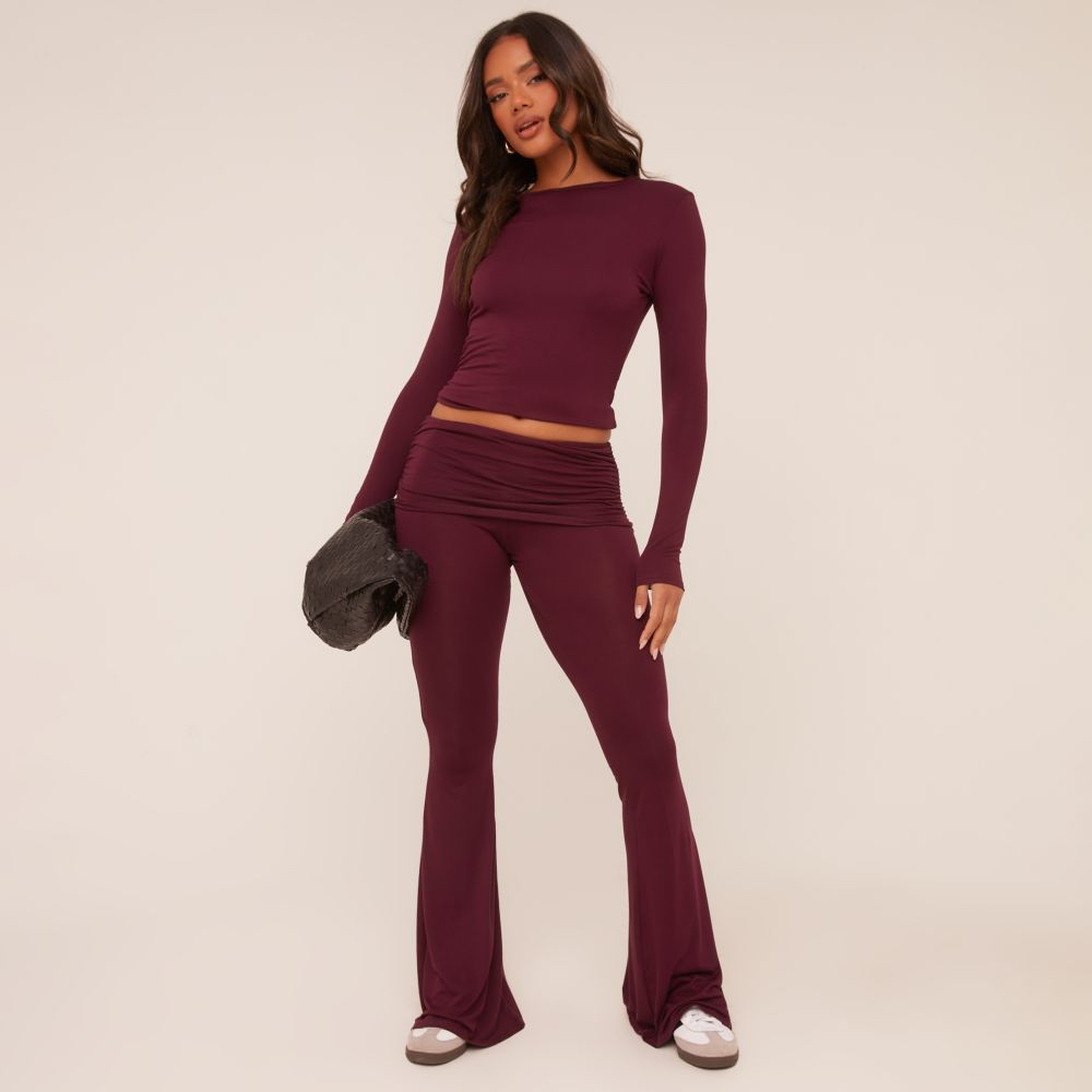 Fold Over Waistband Detail Flared Trousers In Burgundy | EGO (UK)