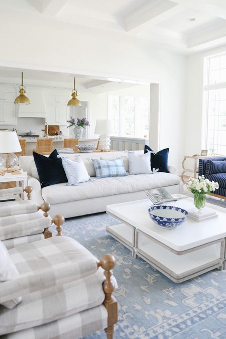 Our new living room pillows from Caitlin Wilson. I selected navy velvet pillows, French blue striped pillows with beautiful bow details, and a plaid lumbar to tie everything in. 

#LTKstyletip #LTKFind #LTKhome