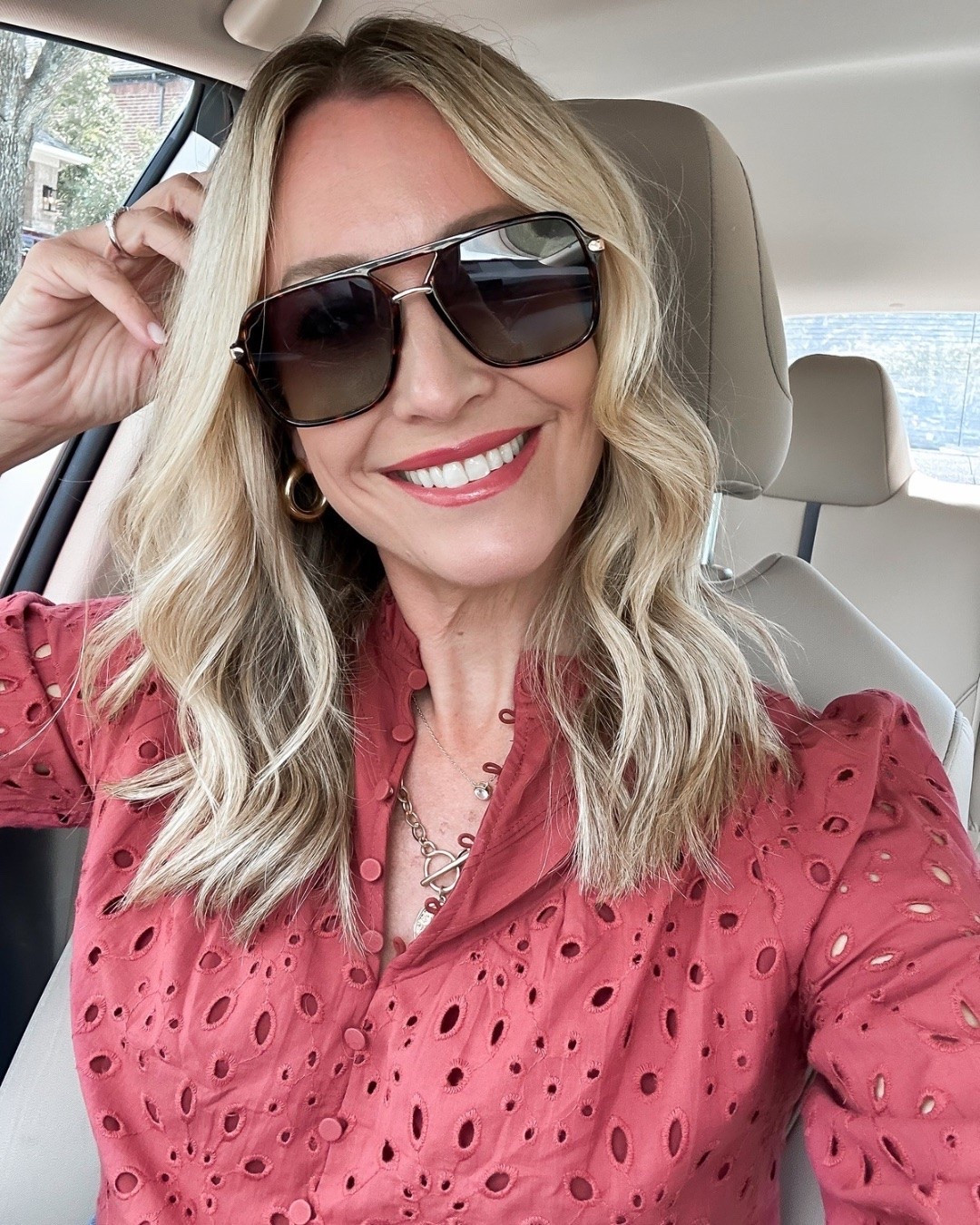This eyelet top is such a good answer to dressing for fall when it’s still 90 degrees outside. The deeper color feels seasonal, but the breathable eyelet keeps it from feeling too heavy for right now.

fall transition outfit, eyelet top, early fall fashion, transitional style, fall tops, warm weather fall outfit, everyday style, casual fall fashion, women’s fall outfits, end of summer style, fall color palette, hauteandhumid

#LTKootd #LTKOver40 #LTKSeasonal