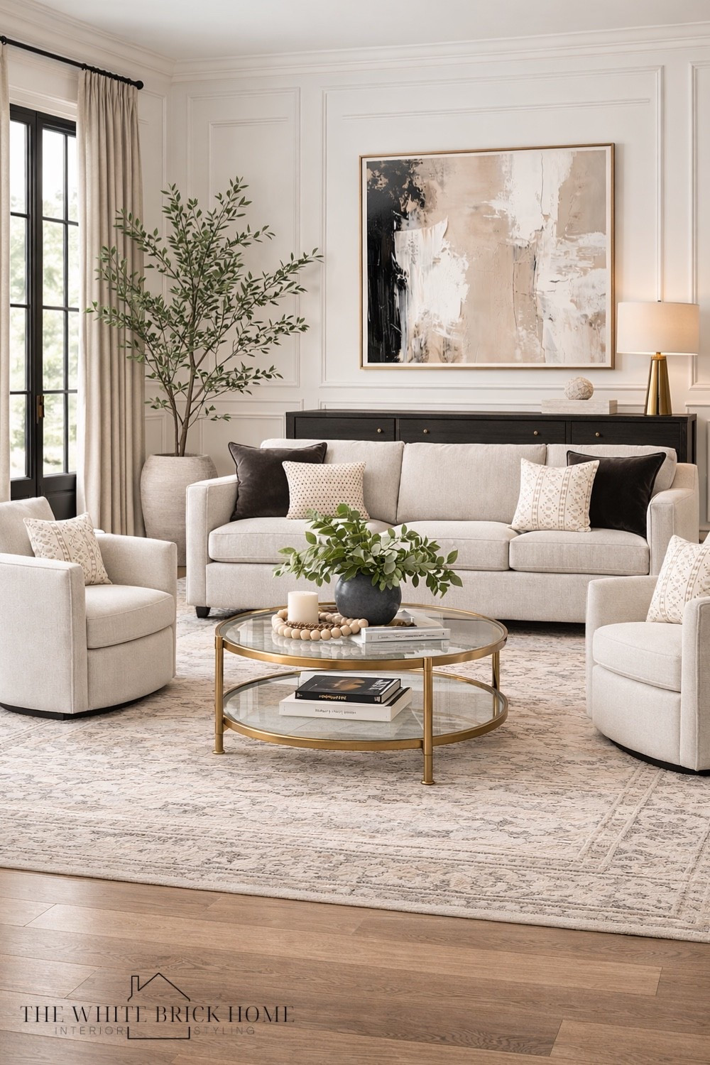 Classic neutrals, layered textures, and timeless paneling - this modern traditional living room is effortless elegance. 
🖤🖤
Living room, living room decor, living room ideas, living room design, living room area rug, rug, living room coffee table modern living room, table lamp, lamp, throw pillows, decor, home decor, home design, faux tree, wall art, media console, living room inspiration, living room ideas, living room decor ideas, home design, McGee and co, pottery barn, crate and barrel 


#LTKSeasonal #LTKHome #LTKSaleAlert