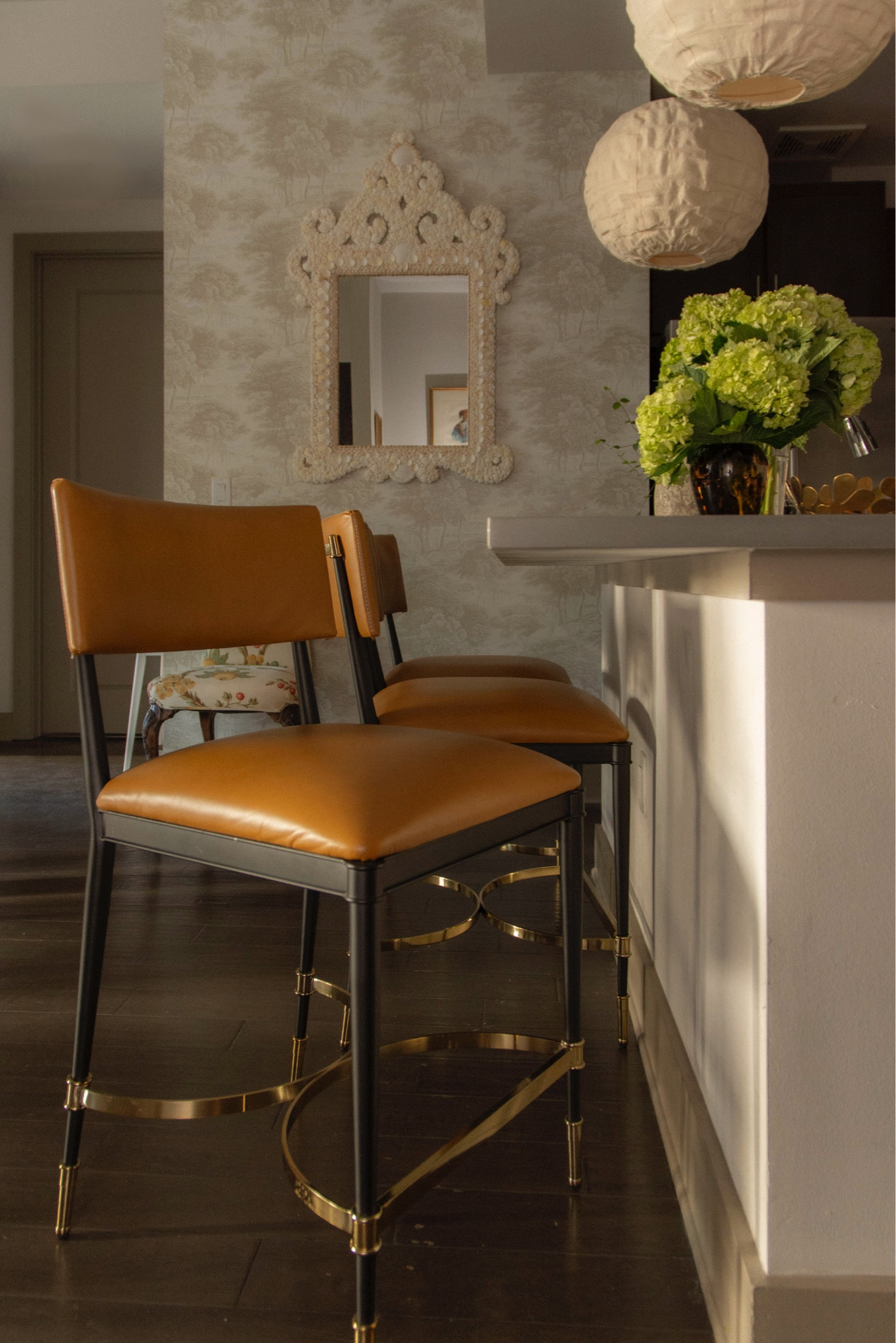The chicest leather counter stools with black and gold metal accents. These upholstered barstools are so comfortable and well-made! Classic kitchen design, interior design tips, kitchen design ideas, Frontgate review 

#LTKHome #LTKStyleTip