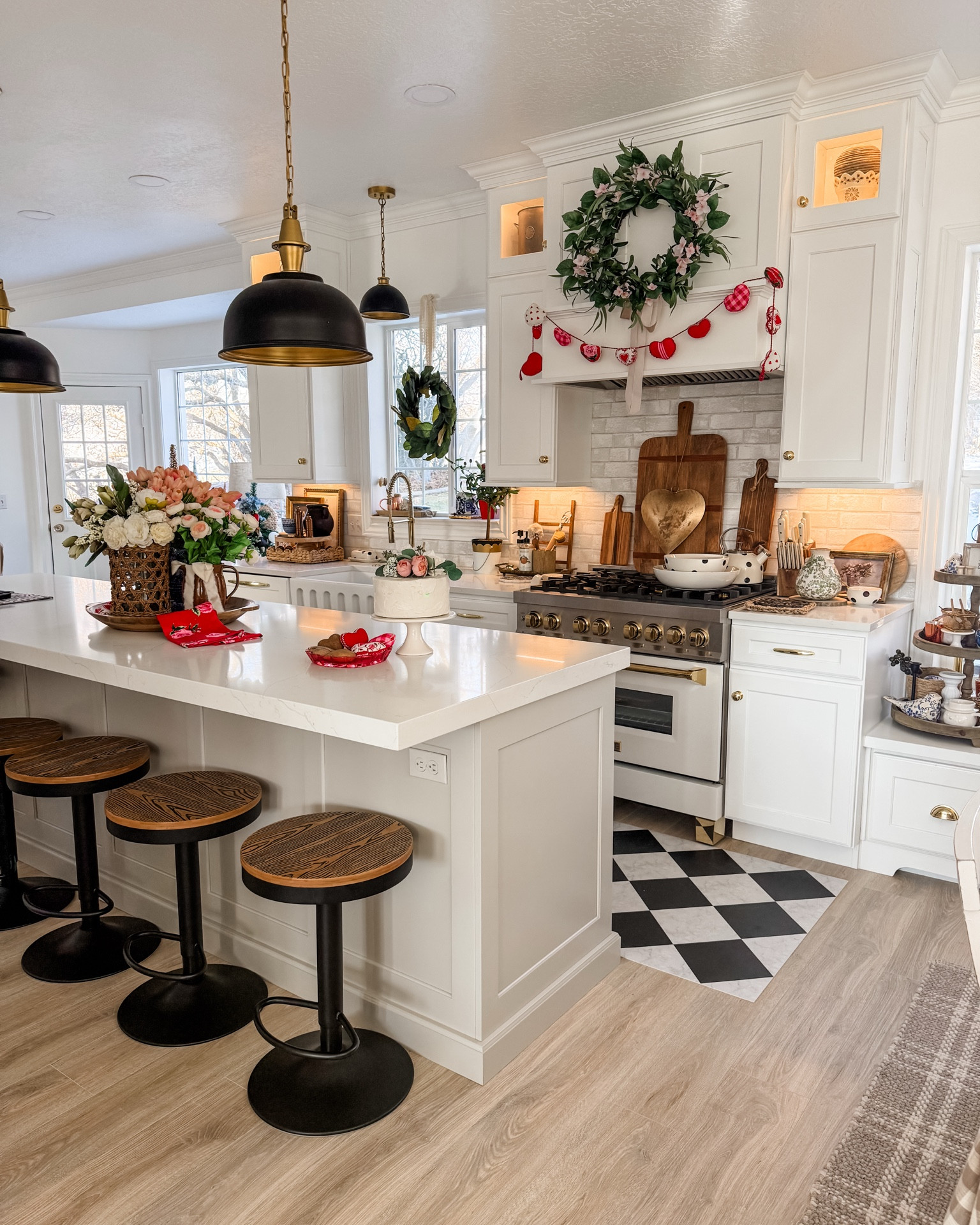 Enjoy a lovely Spring kitchen. Lighting, bar stools that are adjustable in height and darling decor make it cozy. 

#LTKSeasonal #LTKHome #LTKMostLoved