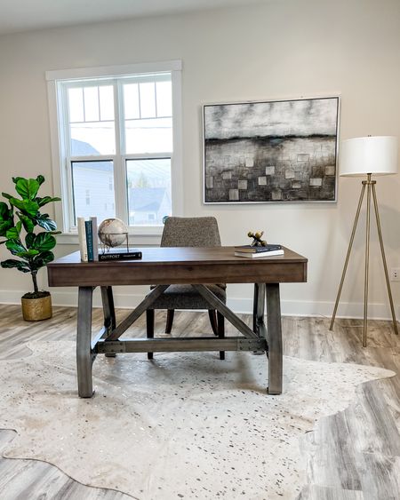 We love the different textures incorporated in this home office from the metal lamp to the wood desk to the fabric chair. 

#LTKhome #LTKfamily #LTKstyletip