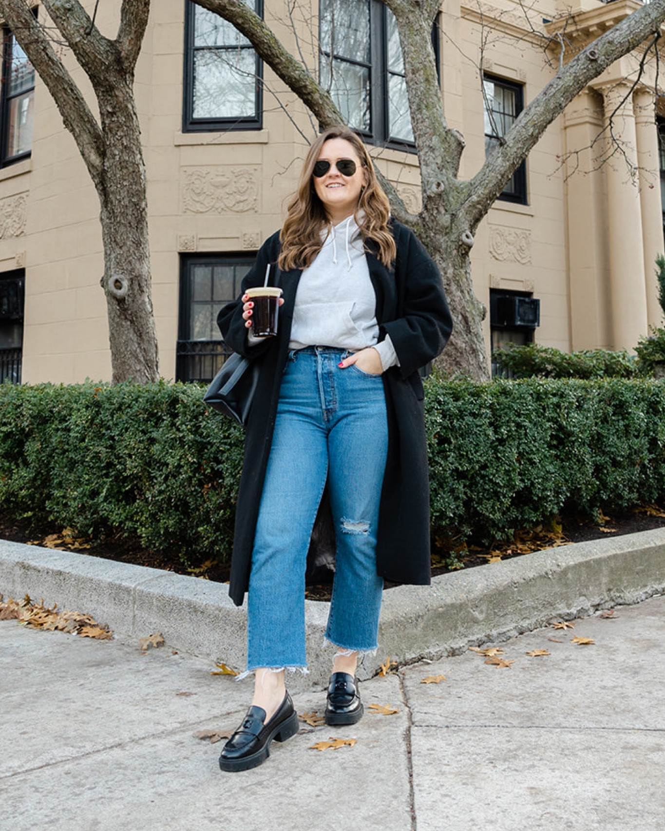 Grey hoodie, black wool coat, lug sole loafers, flare jeans

#LTKstyletip #LTKshoecrush #LTKSeasonal