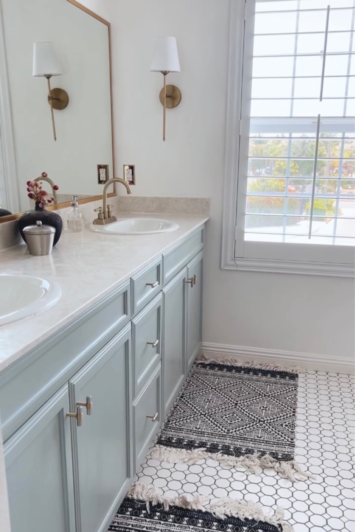 Master bathroom details.

Cabinet color: Iced Marble Benjamin Moore

Master bathroom
Blue cabinets
Bathroom mirror DIY
Mirror trim
Bathroom knobs
Sconce 
Bathroom decor


#LTKover40 #LTKhome #LTKstyletip