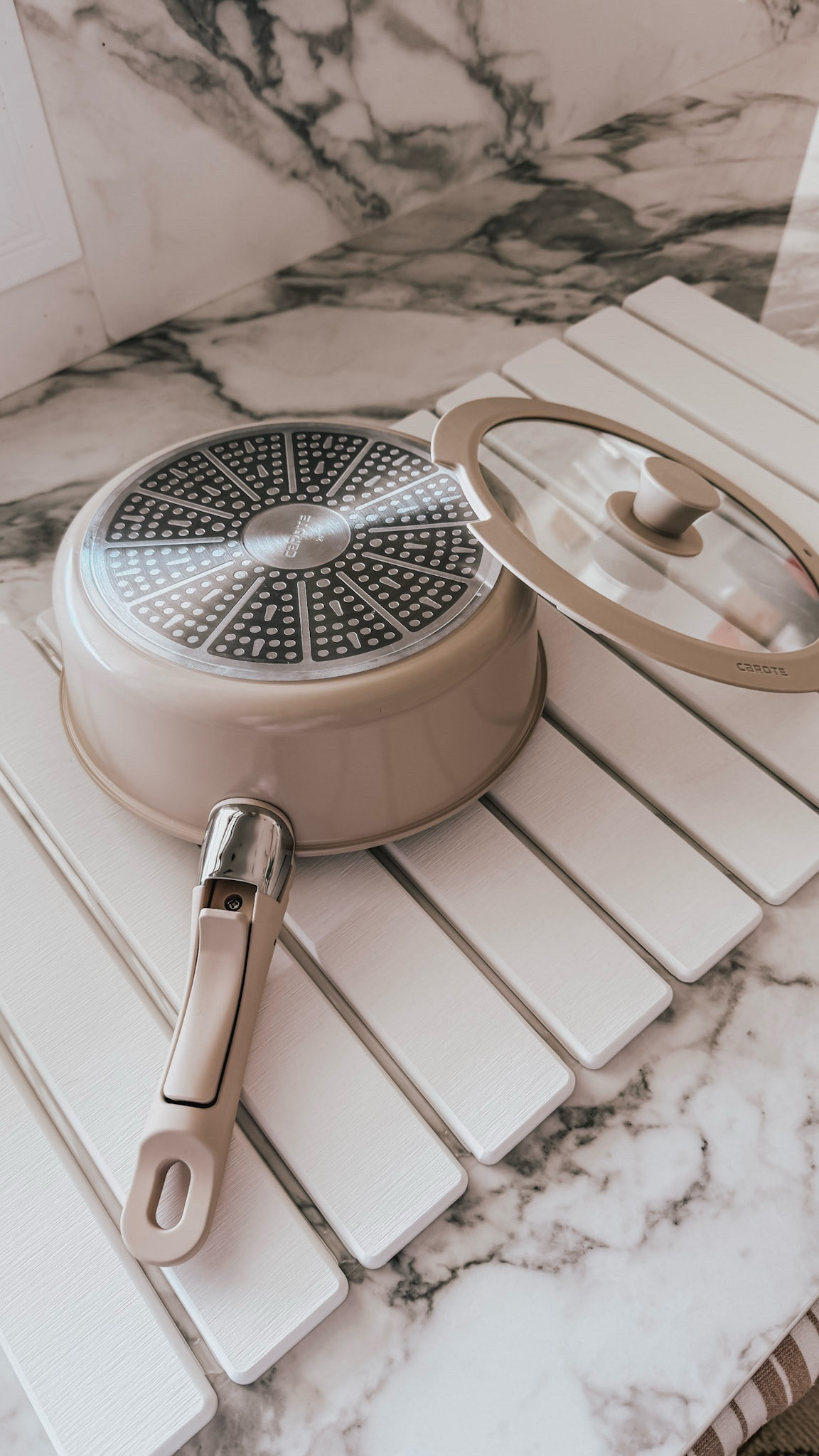 I love how this quick dry stone dish mat can store away in a drawer and also looks great on the countertop!

#LTKHome