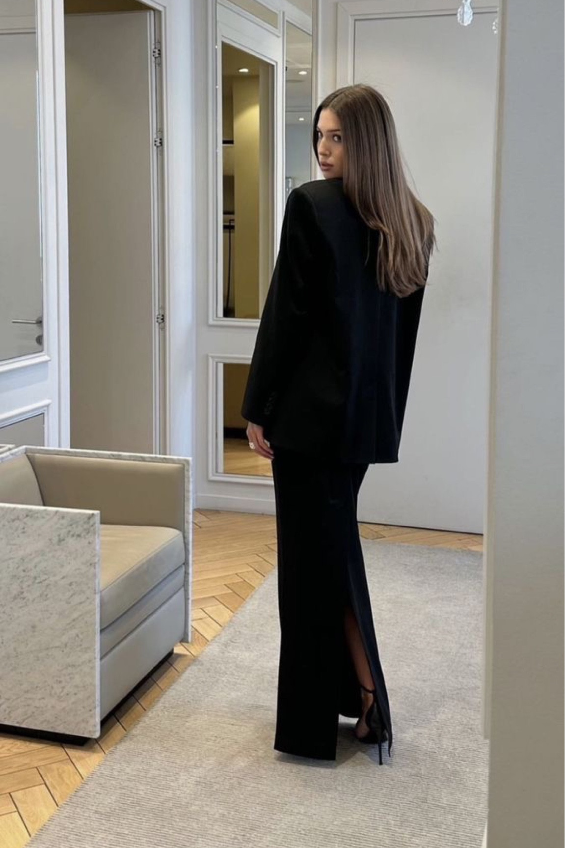 Get the look
Black blazer 
Black oversized blazer 
Black slip dress 
Black skirt 
Black strappy heels 
Black open toe heels 
