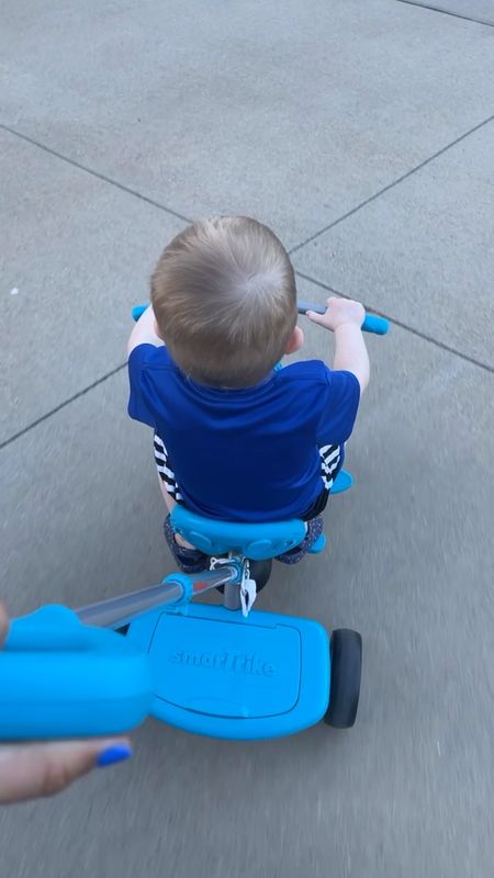 We love our Smartrike! The handle I am pushing is removable which then allows your kiddo to steer themselves! When it is in, you steer for them! Great trike to learn on!

#LTKunder100 #LTKkids #LTKSeasonal