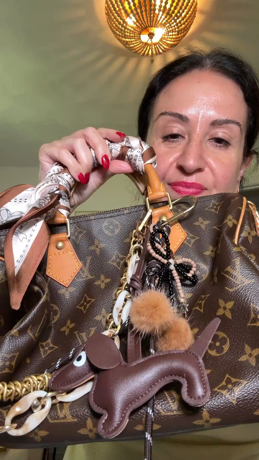 Linking all the charms on my bag.

#LTKOver40 #LTKSaleAlert #LTKmomlife