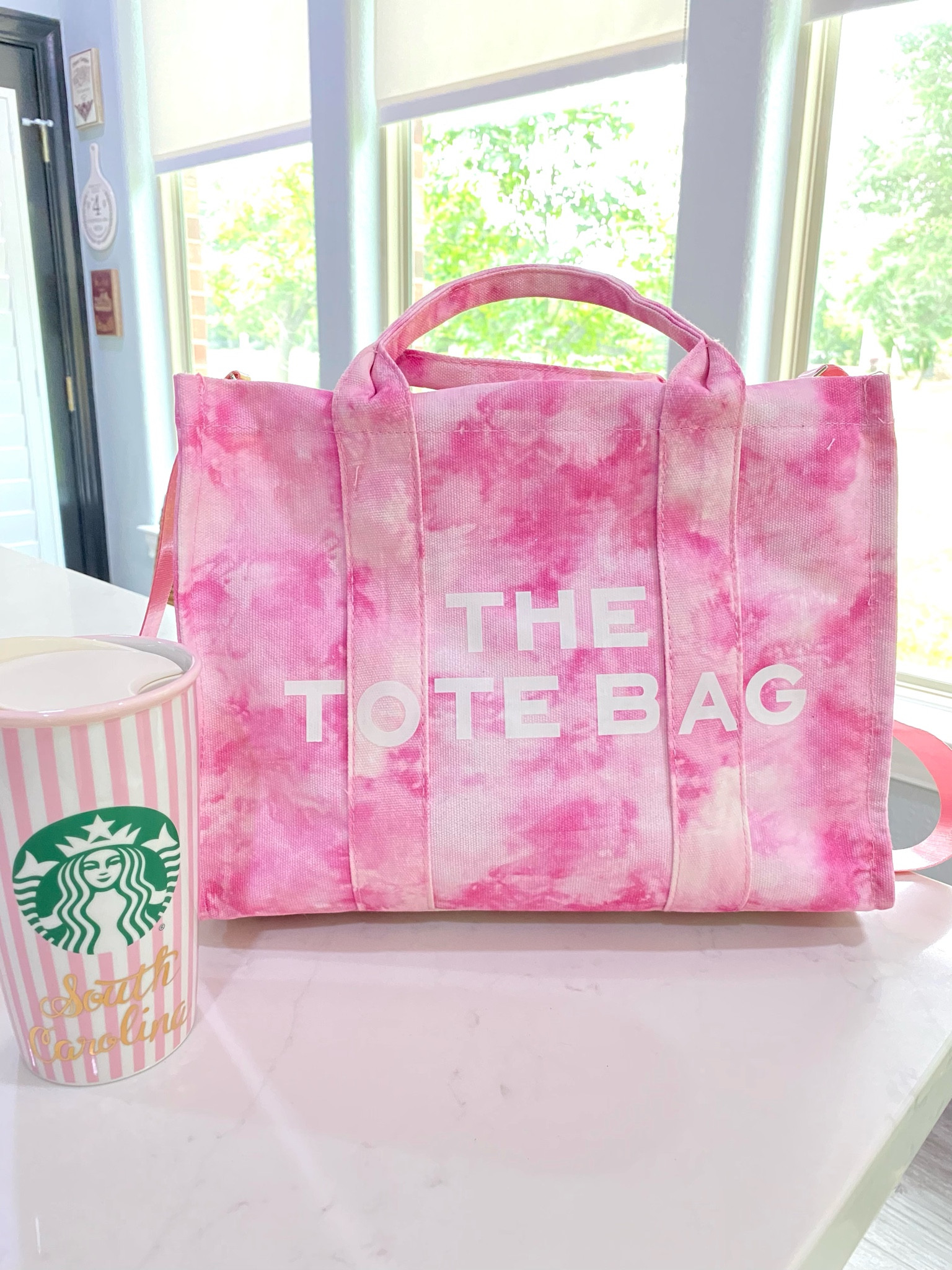 The PERFECT DUPE tote bag! UNDER $30!! Friends, you need this for the season. Makes a great gift, Mother’s Day gift, or for YOU. THICK quality canvas and comes with a strap. #thetotebag #mothersdaygift #LTKunder30 #giftideas #springtotes #summertote #tiedye #pinktote

#LTKstyletip #LTKitbag #LTKGiftGuide