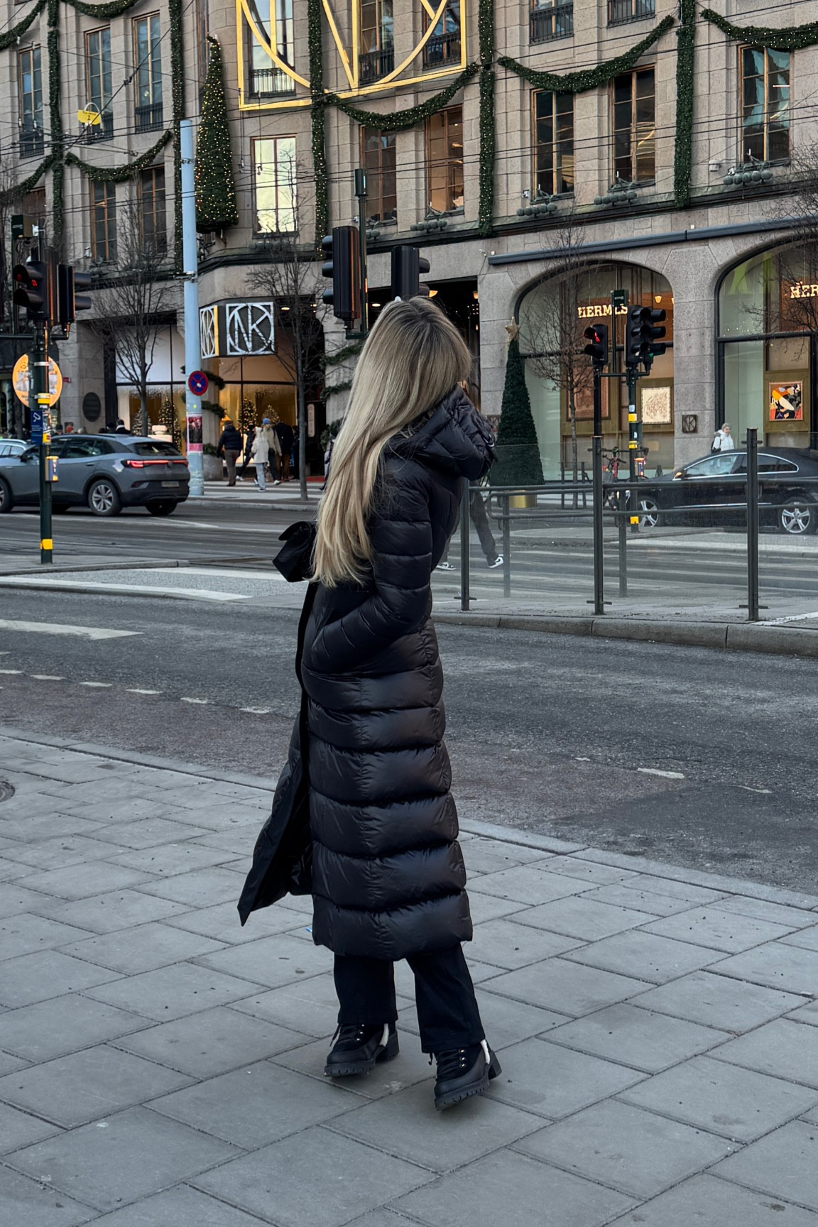 The perfect fitted long down puffer jacket in a shiny black finish with stylish detailing. Been stopped so many times on the street wearing it. Love the waistbelt and the fact that it can be worn without yet stil looking fitted. It’s not super bulky as most down jackets are - yet still warm. Perfect chic long puffer jacket 👆

#LTKStyleTip #LTKSeasonal #LTKHoliday