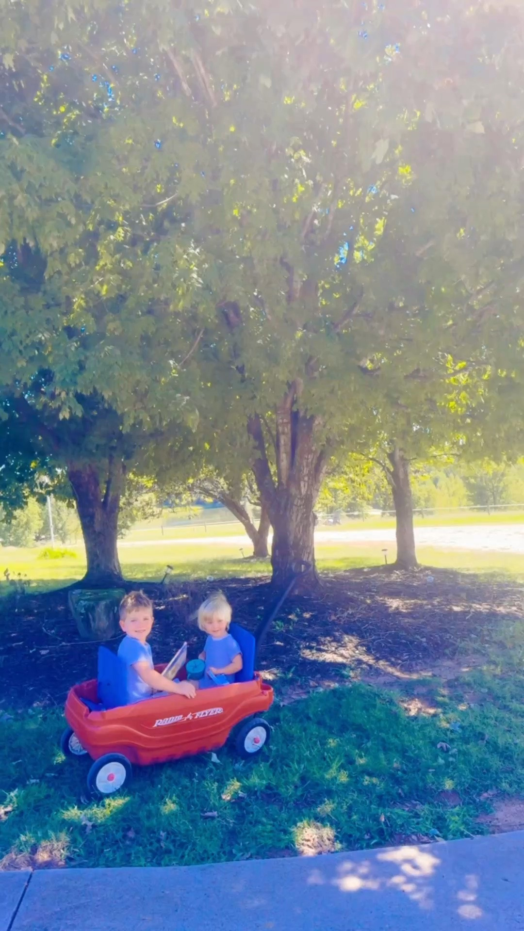 This stunning fall day called for a red wagon ride down to the pond 🩵 and an autumn 🍂 story time 📖 outside at the bottom of the farm!! 🌼 Truly feels like such a dream 💭 that this is our forever home sweet home 🏡 and farm we always prayed for!!! 🥰