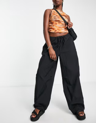 Topshop oversized balloon nylon parachute pants in black | ASOS (Global)