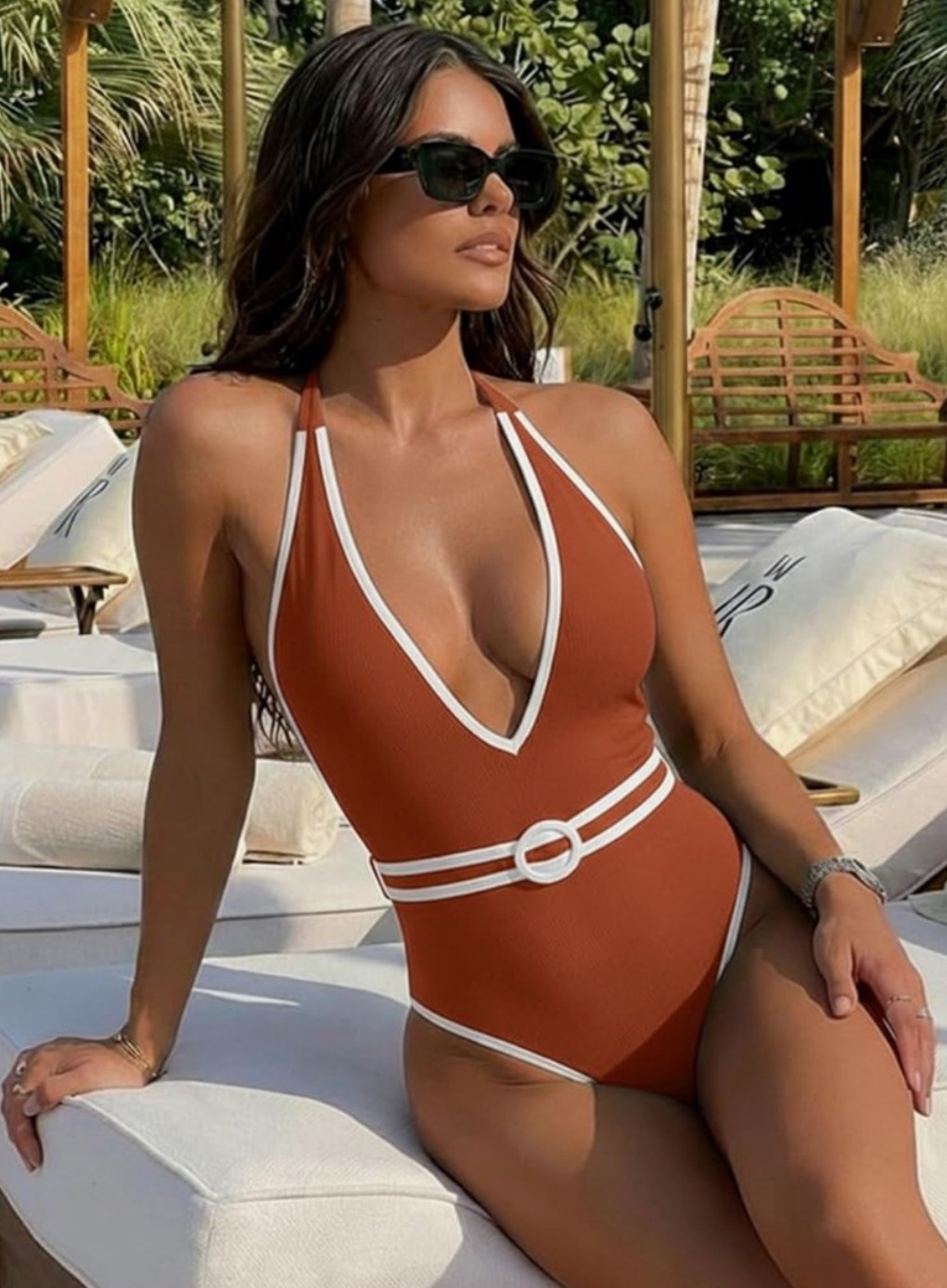 The kind of one-piece that looks like it belongs somewhere with striped towels, private docks, and chilled sparkling water. ☀️ This color block swimsuit gives a polished deep V neckline, tummy-control fit, backless halter shape, and sleek beach vacation energy for clubs, yacht days, resort pools, and sun-soaked mornings by the water. 

Secure the swimsuit that makes your swim look feel first class. 🌊

#LTKTravel #LTKSwim #LTKSeasonal