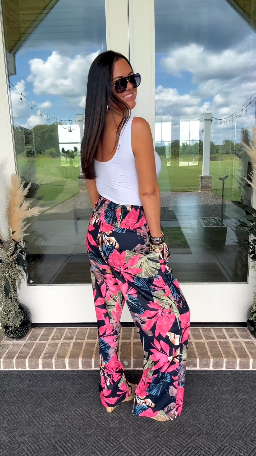 STOP. These Amazon floral pants have pockets. 🌸 Flattering fit, comfy elastic waist, and they look so cute with a simple white bodysuit and denim vest. 

#amazonfashion #widelegpants #floral #amazonfind

#LTKootd #LTKSeasonal #LTKTall