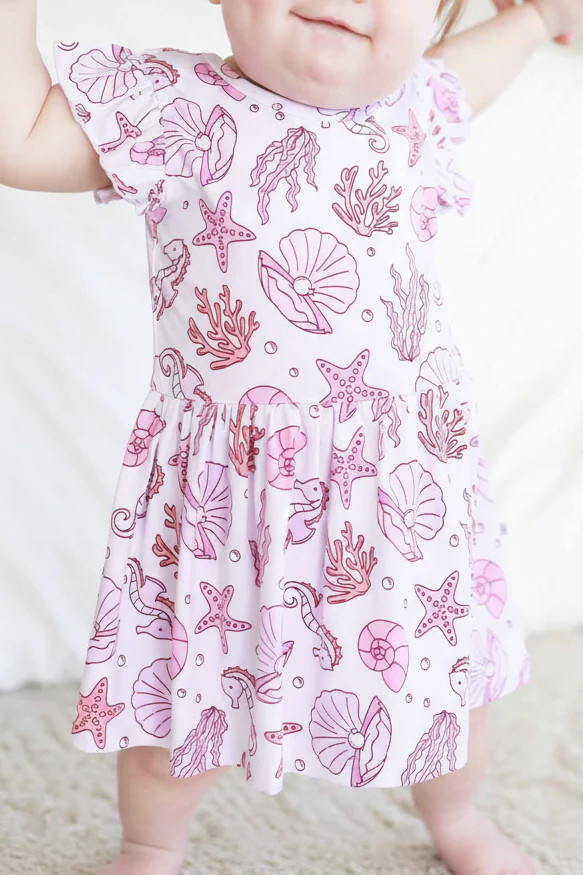 Sleeveless Twirl Bodysuit | Tiny Tides Pink | Caden Lane