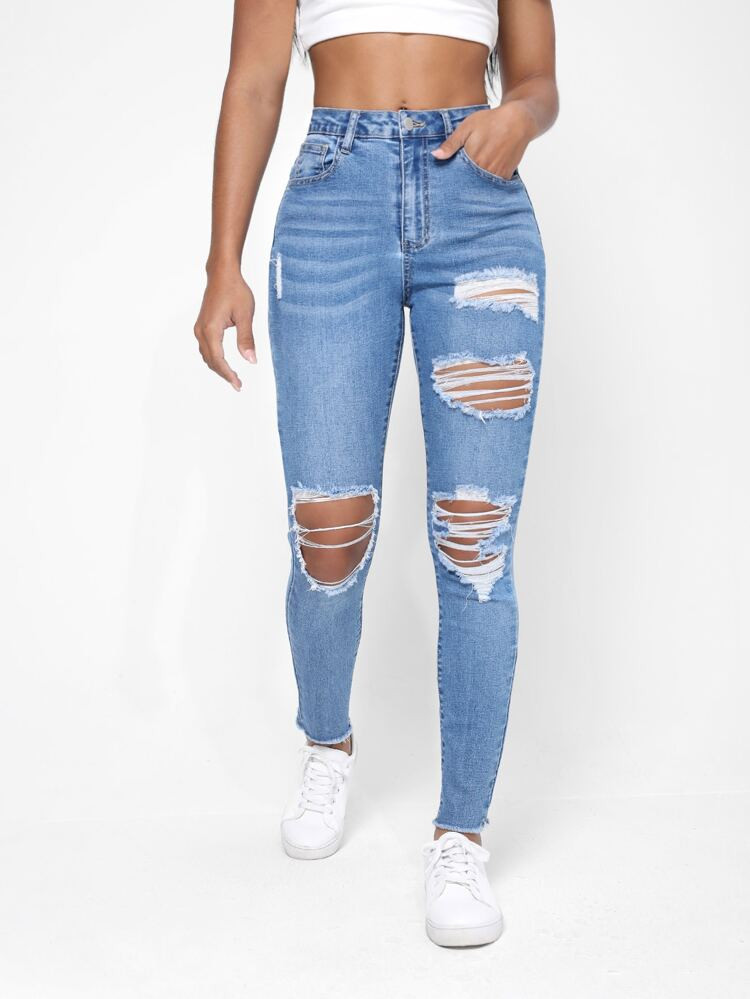 Ripped Cut Out Raw Trim Skinny Jeans | SHEIN