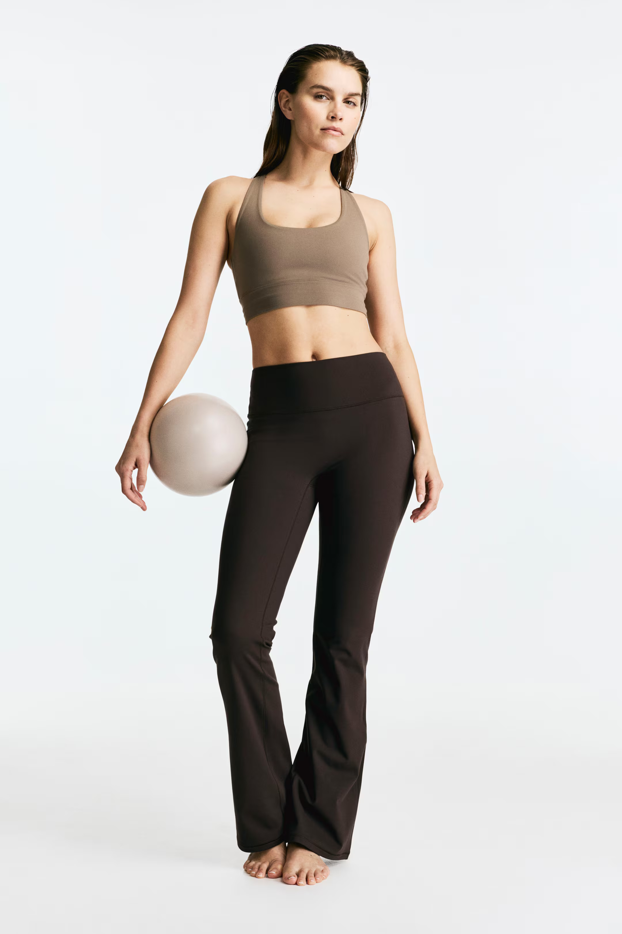 Flared sports leggings with SoftMove™ | H&M (UK, MY, IN, SG, PH, TW, HK)