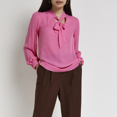 Pink pleated tie neck blouse | River Island (UK & IE)