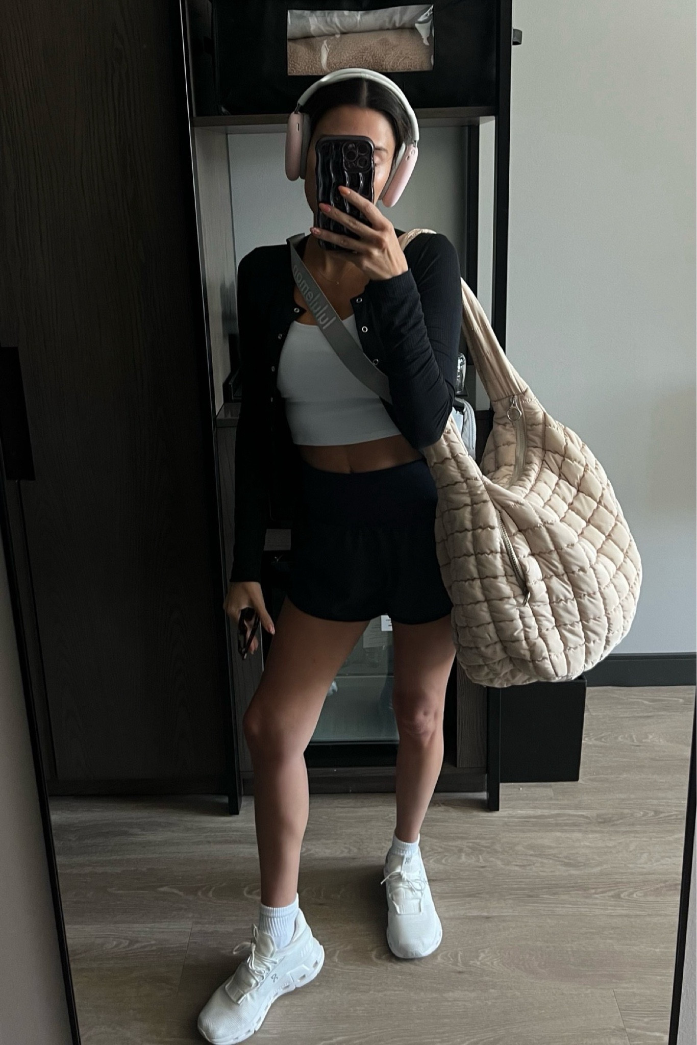 Gym look - still obsessed with this oversized quilted tote!  Comes in a bunch of colors and it’s so easy to wipe and keep clean. Works great for a gym bag and every day mom bag. Great for travel too!

Gym bag, travel bag, mom bag, quilted bag, oversized bag, quilted tote, gym tote, workout outfit, gym outfit, casual outfit, travel outfit, workout look, gym shorts, neutral bag, free people bag, Christine Andrew 

#LTKTravel #LTKItBag #LTKFitness