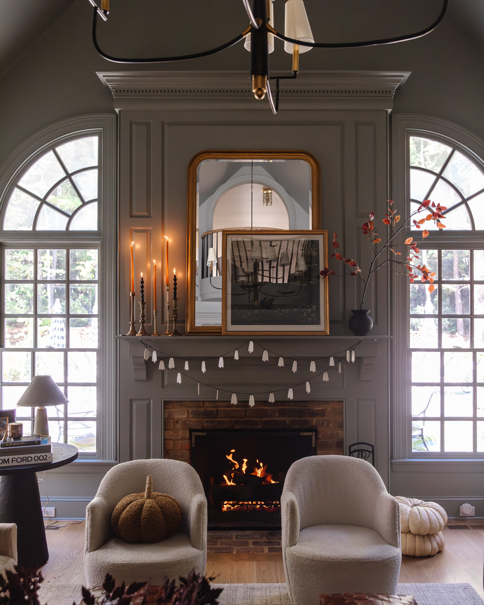 #AD We love spooky season but want it to feel elevated and moody, not cutesy. I found all of these great finds at Wayfair that feel a little eerie without being over the top - a set of glass cloches, some dripping wax LED pillar candles, a dark purple foliage wreath on the door, and a cauldron full of treats on the coffee table. Linked all of my finds here for you - make sure to shop them before they sell out! @wayfair #wayfair #WayfairPartner 

 #LTKSeasonal #LTKHome