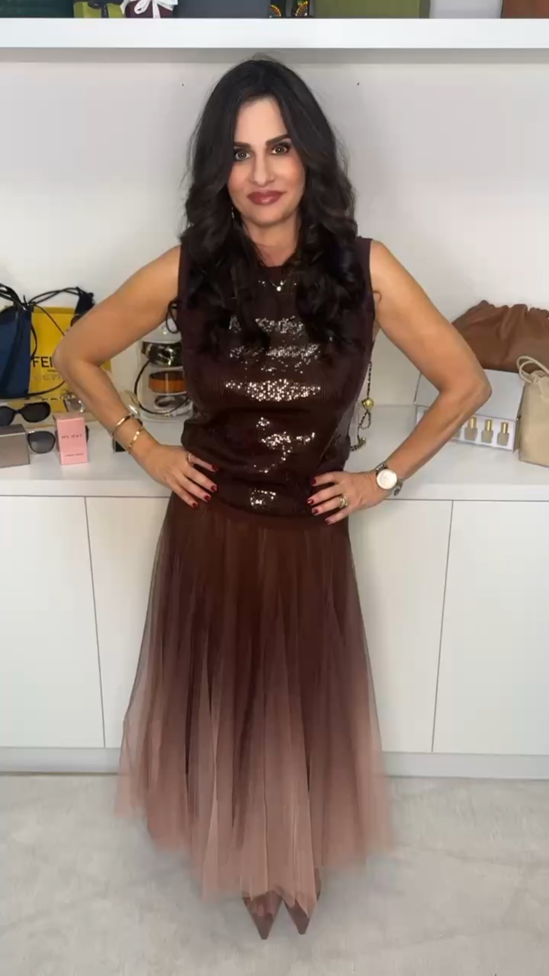 This sequin top is so well made and pairing with a tulle skirt is perfection! Wearing a sm top and XS skirt . Heels are on sale . 

#LTKOver40 #LTKootd #LTKSeasonal