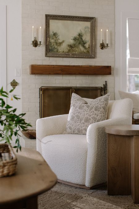 Living room accent chair, boucle chair, cozy chair with pretty wood detail at the bottom, currently on sale 

#LTKsalealert #LTKhome #LTKSpringSale