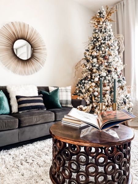 Our Christmas living room! Neutrals and metallics with a pop of green🖤 9’ pre-lit flocked Christmas tree on sale for under $200! We’ve had ours for 5 years now! 

#LTKfindsunder50 #LTKhome #LTKHoliday