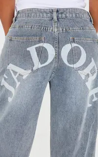 Vintage Light Wash Shape Vintage Light Wash Low Rise Washed Jadore Print Wide Leg Denim Jeans | P... | PrettyLittleThing US