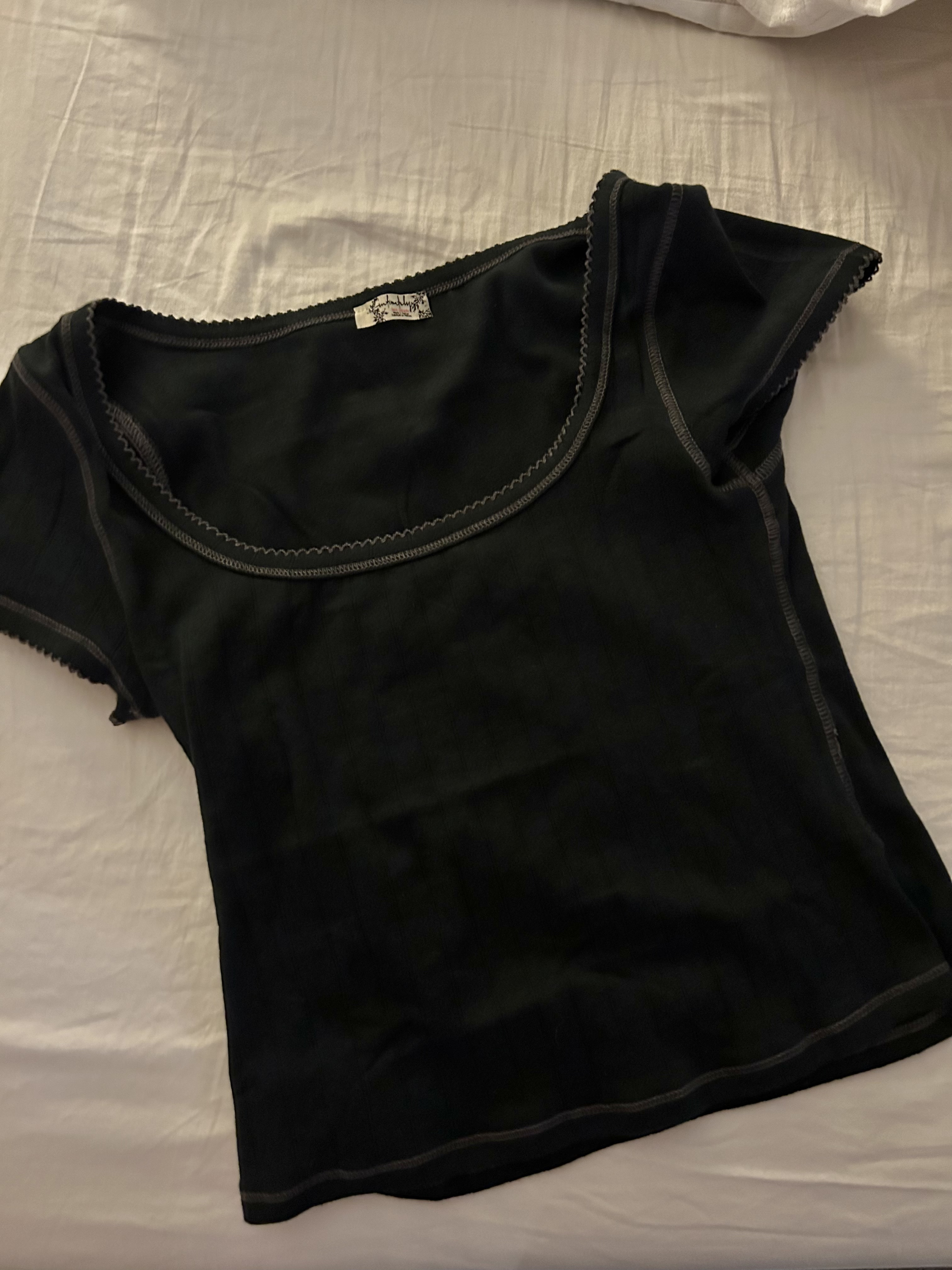 My favorite free people basic tee 🖤 

#LTKGiftGuide #LTKFindsUnder50 #LTKHoliday