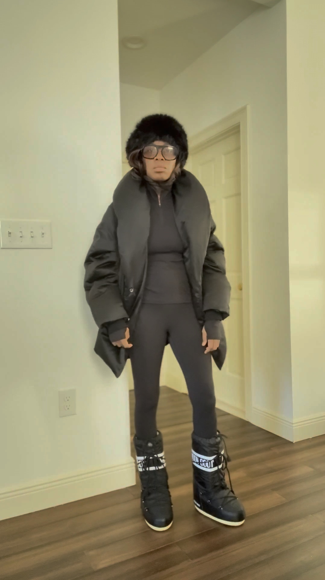 Apres ski outfit. Black puffer coat, moon boots, fur headband 

#LTKootd #LTKPetite