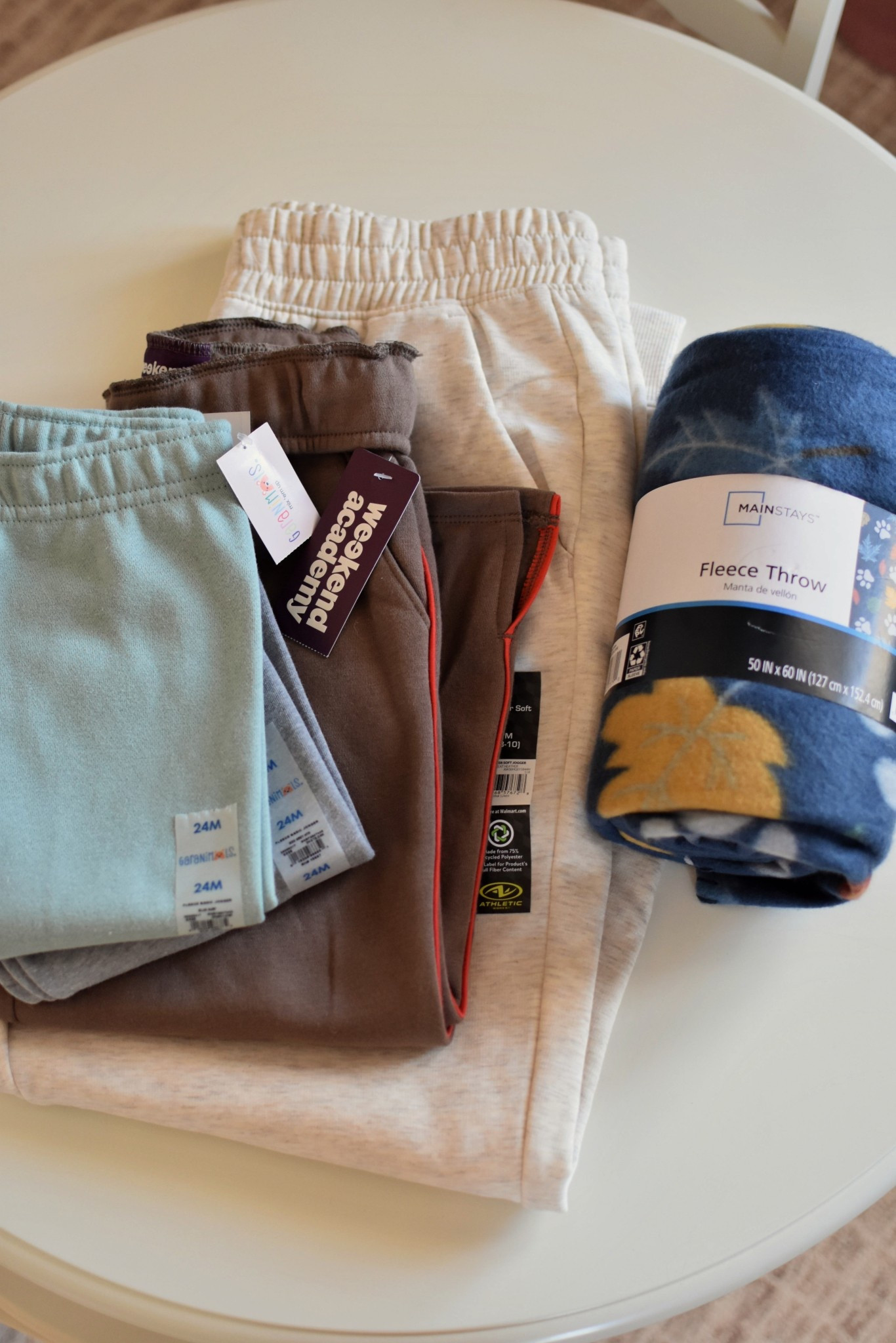 Sweats for the family!! Everything fits true to size for us. The camo pair (linked but not pictured) are men’s so I sized down to a small!