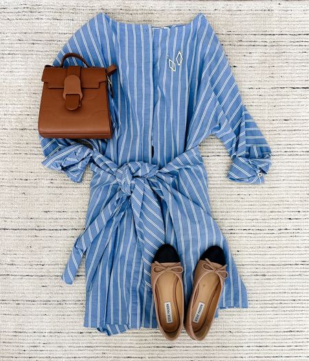 Business casual workwear with this blue and white striped mini wrap dress that is so flattering on! 100% cotton poplin so it keeps you cool on warmer days. On sale for 60% off! Can be worn with flats or pumps for work, sandals for spring outfits or sneakers for a more casual every day look

#LTKstyletip #LTKSeasonal #LTKsalealert