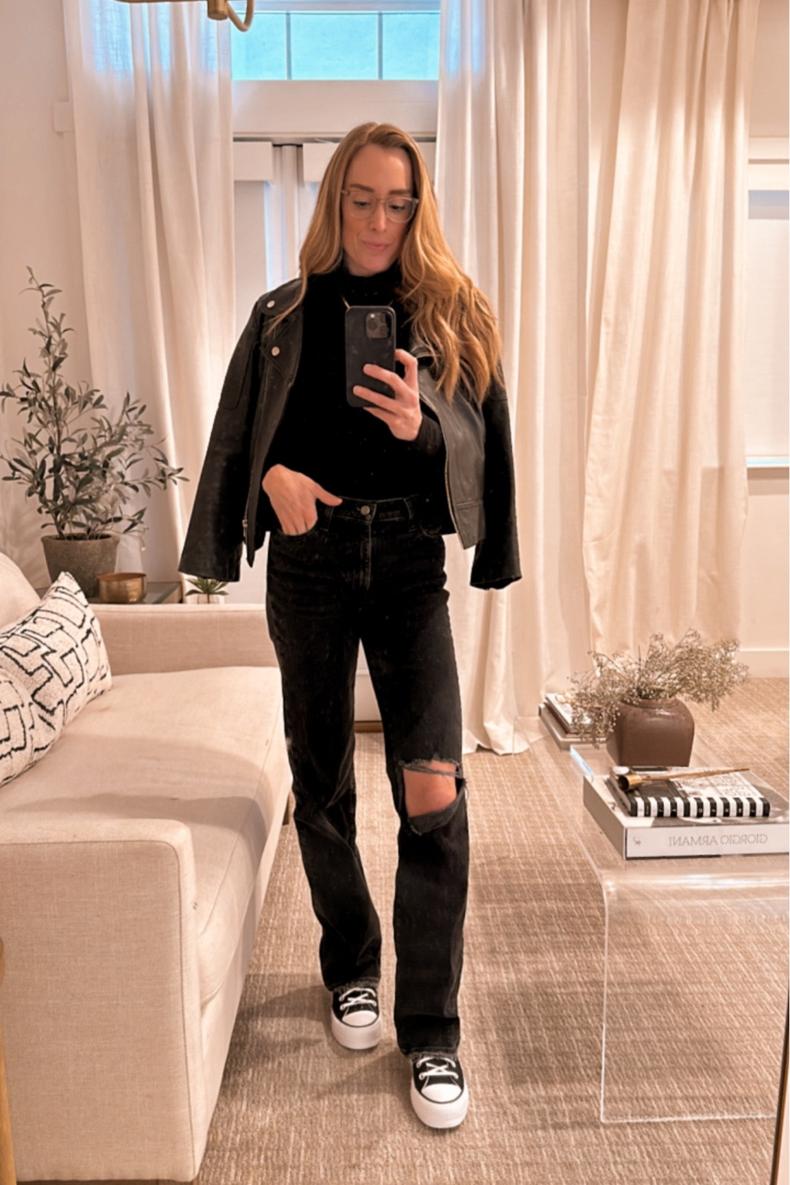 Black distressed jeans, leather jacket, chucks !

#LTKworkwear #LTKMostLoved #LTKfindsunder100