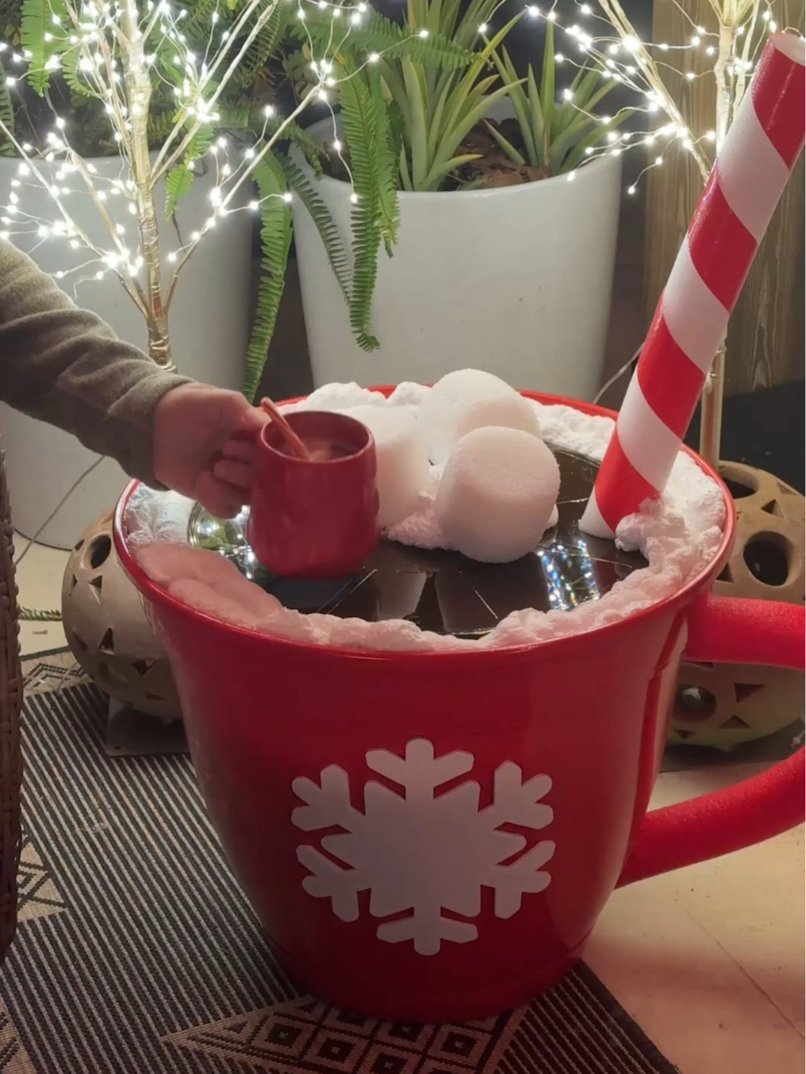 DIY hot cocoa side table 👉 we used dollar tree foam blocks for marshmallows and dollar tree foam snowflakes for the snowflake on the giant cup.  

#LTKHoliday #LTKSeasonal #LTKHome