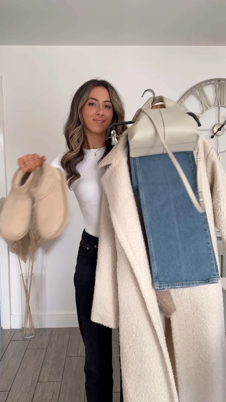 Creamy outfits, neutral look, oversized knit jumper, blue denim jeans, cream oversized coat, neutral Uggs. 

#LTKSeasonal #LTKVideo #LTKstyletip