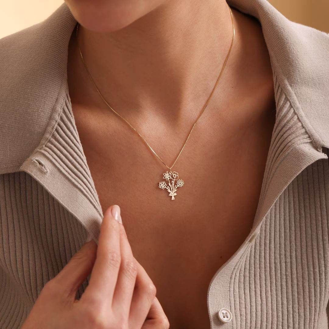 Celebrate the meaningful stories woven through your family with this beautifully crafted birth flower necklace from YourNamesJewelry. Each bloom is personalized to honor the people you hold closest, creating a delicate bouquet that’s as unique as your loved ones. With multiple metal options—from sterling silver to solid gold—you can choose the perfect finish to match any style. Thoughtfully made to order and ideal for birthdays, Mother’s Day, or heartfelt everyday gifting, this timeless piece is designed to be treasured for years to come. #BirthFlowerJewelry #PersonalizedNecklace #FamilyGiftIdeas #MothersDayGifts #EtsyFinds #HandmadeWithLove #DaintyJewelry

#LTKFindsUnder50 #LTKGiftGuide #LTKHoliday