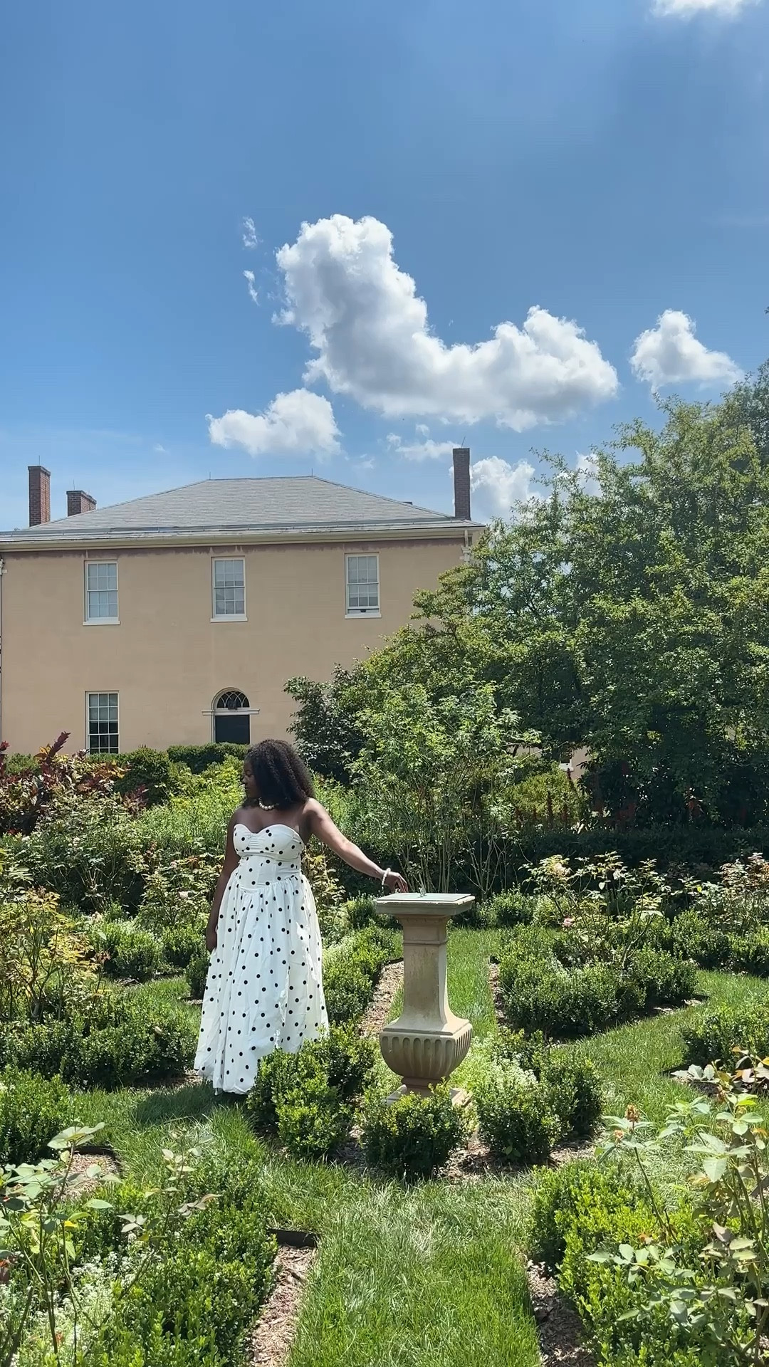 Enjoying this beautiful historical garden in DC in a classic polka dot dress. Standing in front of a Federal Style home, I think it has an old money, classy aesthetic. #oldmoneystyle Old Money aesthetic ,  

#LTKMidsize #LTKTravel #LTKSeasonal