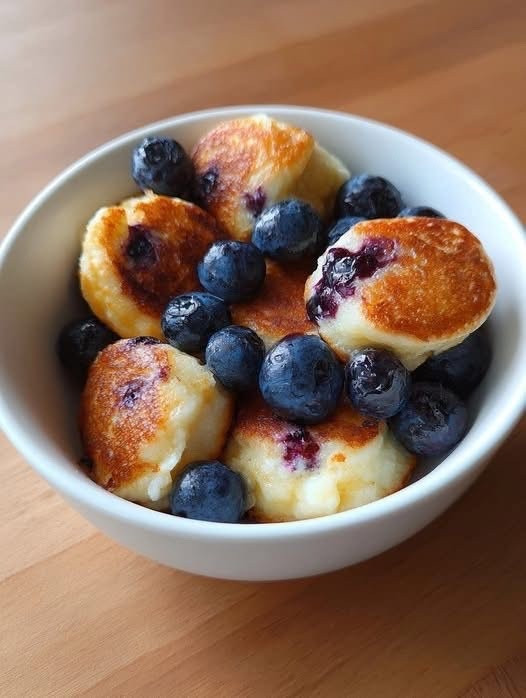 I wanted to share a quick and good recipe!!  Blueberry Cottage Cheese Pancake Bites – Air Fryer or Oven, High-Protein & Sweet

Ingredients (makes 10–12 bites):

1 cup cottage cheese

2 large eggs

½ ripe banana, mashed

½ cup oat flour (or almond flour for low-carb)

1 tbsp honey or maple syrup (optional)

1 tsp vanilla extract

1 tsp baking powder

Pinch of salt

½ cup fresh or frozen blueberries

Directions:

 Step-by-Step:

#LTKU #LTKHome