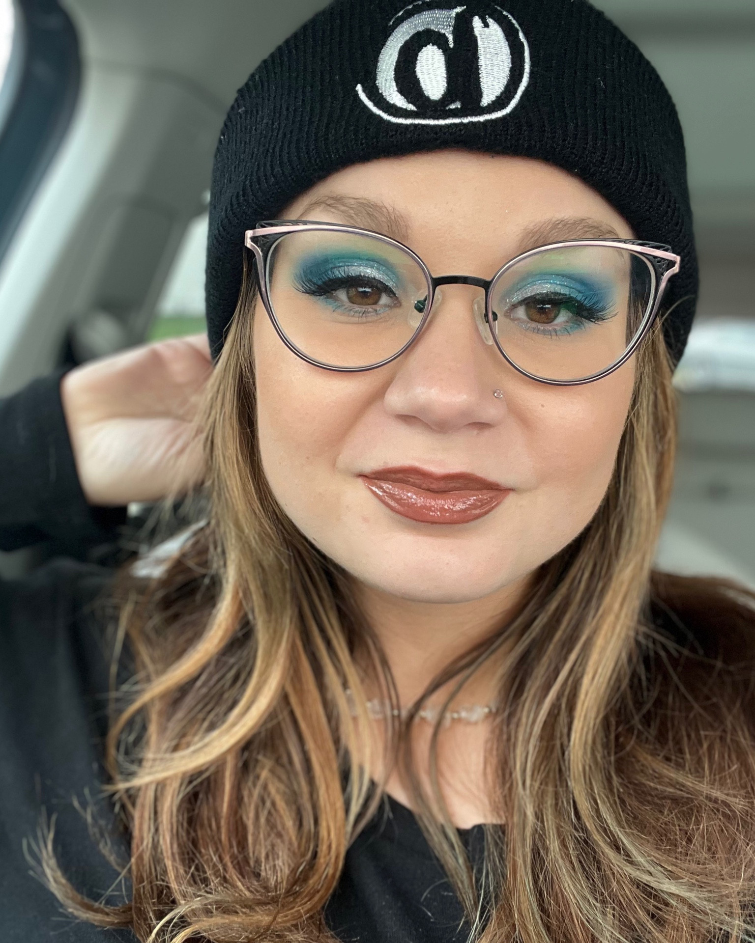 Icy blue and warm browns for this makeup look. A touch of throwback but with a twist. Pops of blue melt into an icy glitter for an eye catching eye look, with full lashes and neutral warm browns for the cheeks and lips to keep it balanced. Paired with my favorite rose gold and black wire glasses.

#LTKbeauty