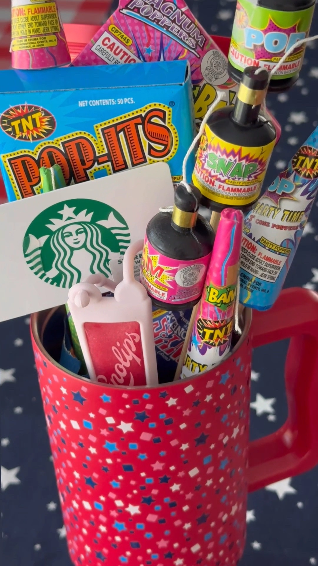 EXPLOSIVE GIFT IDEA! 🧨
I picked up some fireworks from the Target Dollar Spot and decided to add them to this super fun gift idea!!
I added stirafoam to the tumbler and taped the fireworks to skewers to easily stick them into the stirafoam. I finished the gift with some chocolates, a Starbucks Gift Card and my favorite lip gloss and look how cute!!!!! 🎆

#LTKSummerEdit #LTKParties #LTKSeasonal