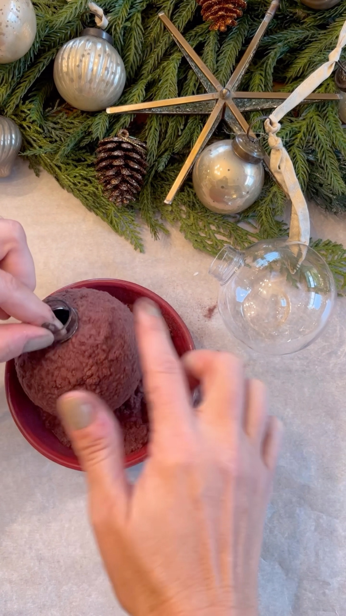 For these easy flocked ornaments, I ordered flocking from Etsy.
I painted a base color similar to the flocking . Next, I added a Mod Podge @modpodgecrafts and put the flocking on top. I let that dry and brushed off the excess. I used Rub n Buff  for the metal part and they turned out beautiful. I’ve used them year after year.