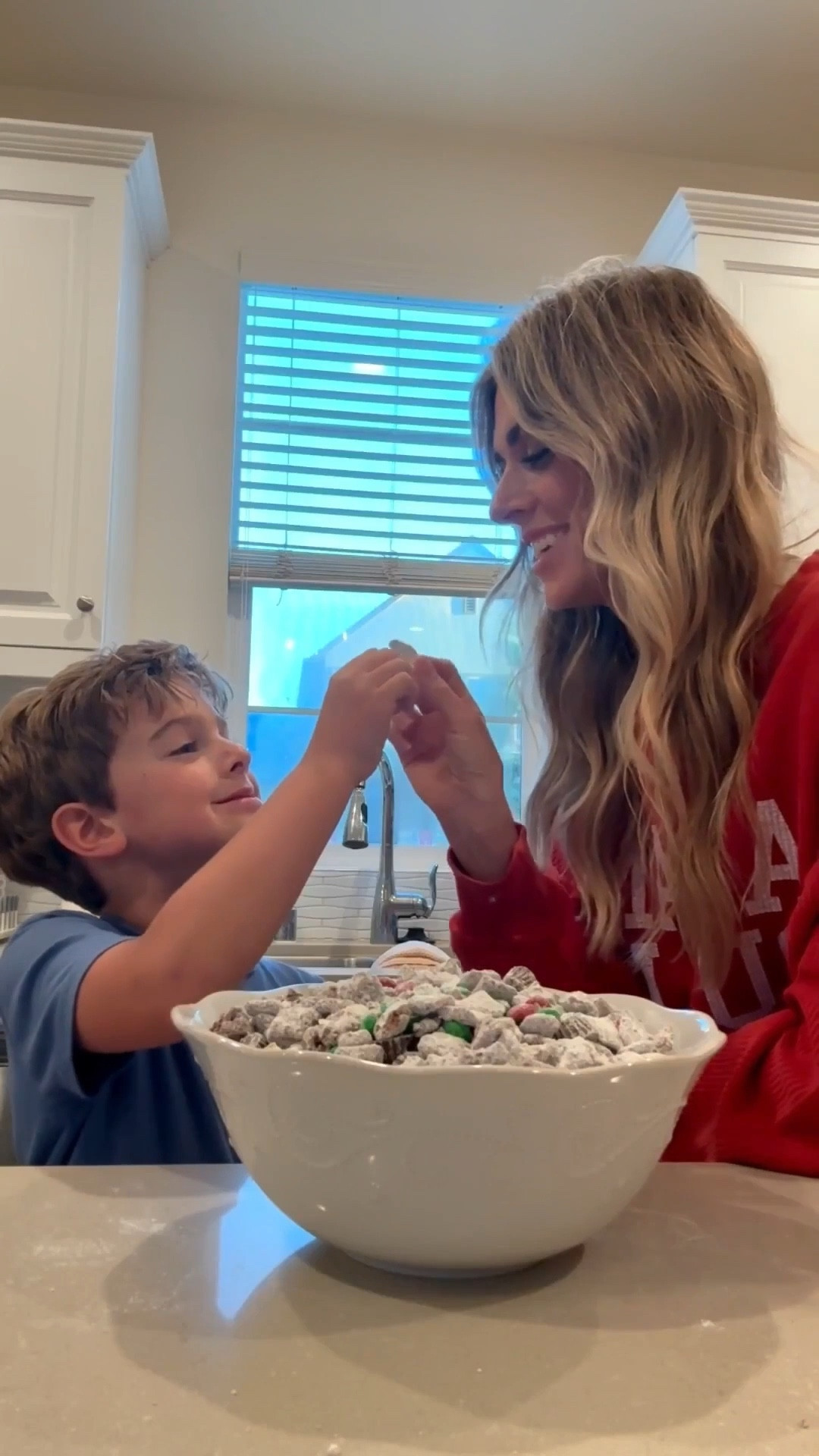 Make Reindeer food with me! My favorite little Christmas treat 🎅🏻🦌 This also makes an easy cute little gift as well 🎁 I linked the containers that you can use for that as well! 
Recipe
• 1 ½ cups semisweet or dark chocolate chips
• 1 ½ cups creamy peanut butter
• 5 cups Rice Chex Cereal
• 1 ½ cups mini pretzels broken into pieces
• 2 cups powdered sugar
• 1 ½ cups red and green M&Ms
• 1 cup mini peanut butter cups

In a large bowl, combine rice Chex cereal and pretzel pieces.
Melt peanut butter and chocolate together, either on the stovetop or in the microwave.
Pour peanut butter chocolate mixture over cereal/pretzel mixture and stir to combine.
Chill in the refrigerator until the mixture just barely begins to set up (about 30 minutes).
Remove the mixture from the refrigerator.
In a separate, large bowl, put ½ cup powdered sugar on the bottom of the bowl. Add half of the chilled mixture, then add another ½ cup powdered sugar over the cereal and the remaining chocolate/cereal mixture.
Gently stir until the powdered sugar is evenly distributed, tossing to coat the cereal with powdered sugar.
Chill the mixture again in the refrigerator until it’s set (about another 30-60 minutes).
Add more powdered sugar, ¼ cup at a time until the cereal/pretzel mixture is coated.
Add M&Ms and peanut butter cups and stir to combine.
Transfer to a serving bowl and serve.

Reindeer food recipe, Christmas treats, Christmas party ideas, Christmas gift ideas, Christmas party favor


#LTKfoodie #LTKHoliday #LTKSeasonal